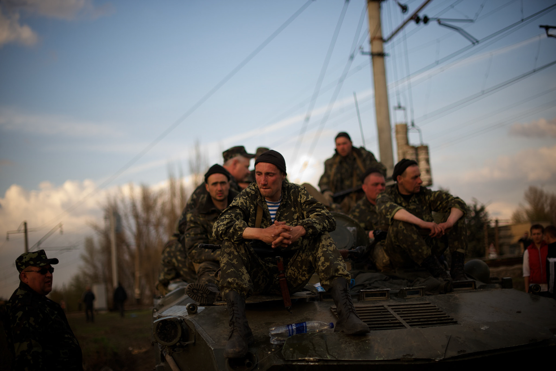 Tears run down a soldierís face as his battalion is forced to surrender to a group of local activists, preventing them from passing through Kramatorsk.