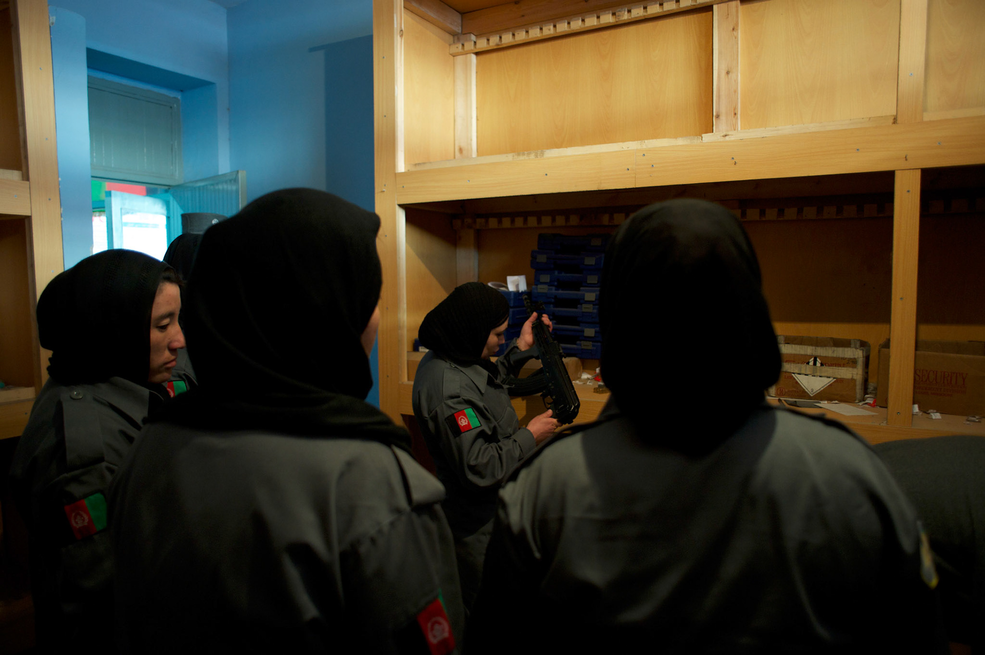 Afghan National Police (ANP) female cadets inspection the arms deposit at the Afghan Nacional Police Academy in Kabul.