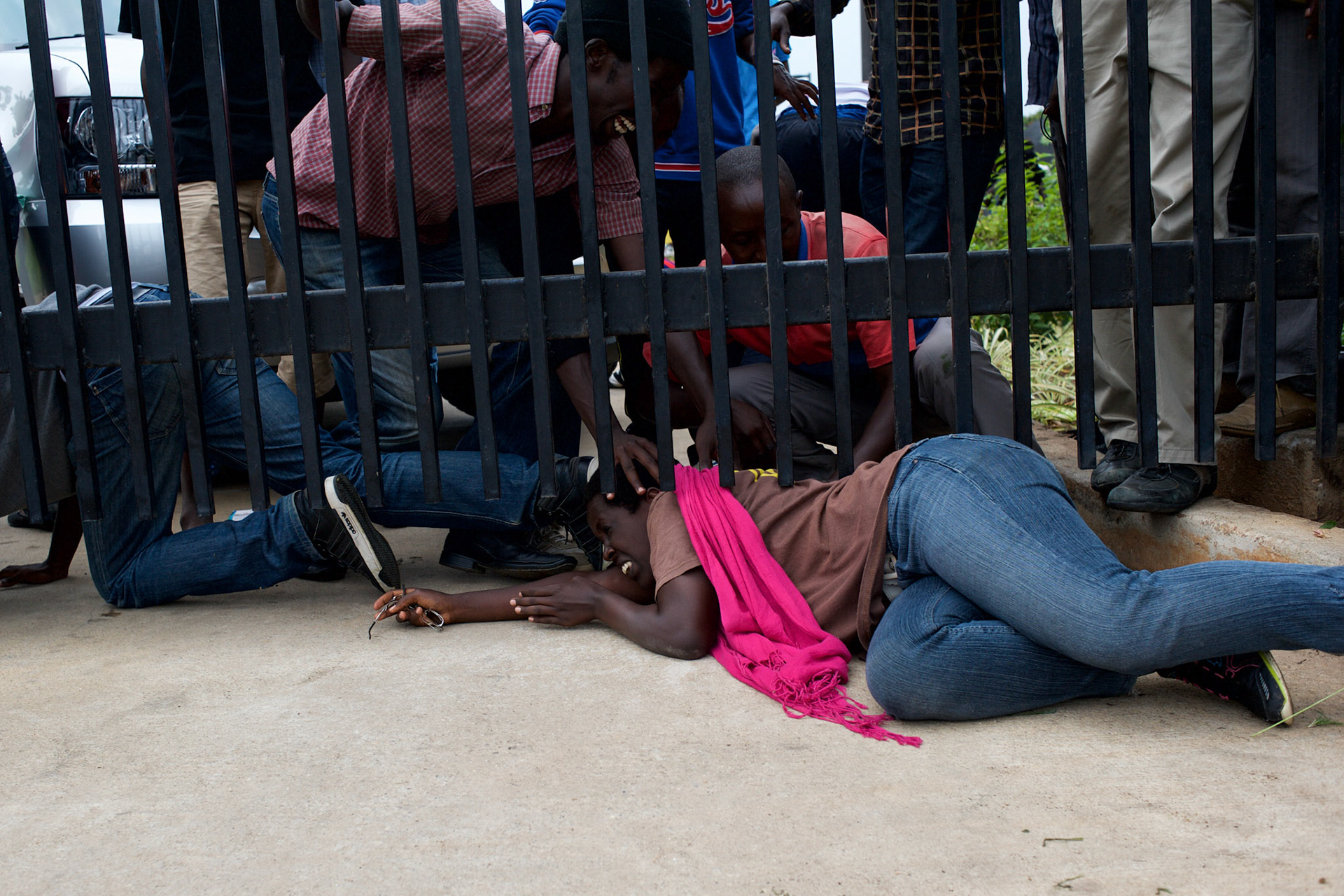 Hundreds of university students storm the embassy grounds seeking refuge from a police advance after a 24 hour deadline to abandon the area expired earlier in the morning. The students moved to the area in early May because, they claim, the US authorities ensure their security, after their university was closed amid anti-government protests. The government closed the university at the end of April, citing ìinsecurityî.