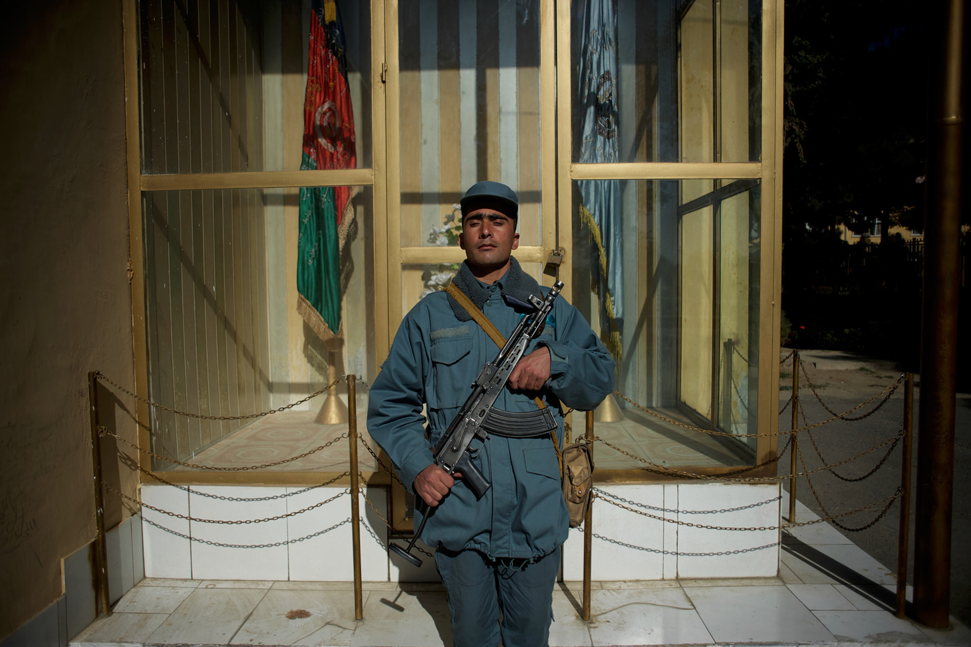 A cadet from the Afghan National Police (ANP) stands guard at the commander's office in the Afghan Nacional Police Academy in Kabul.