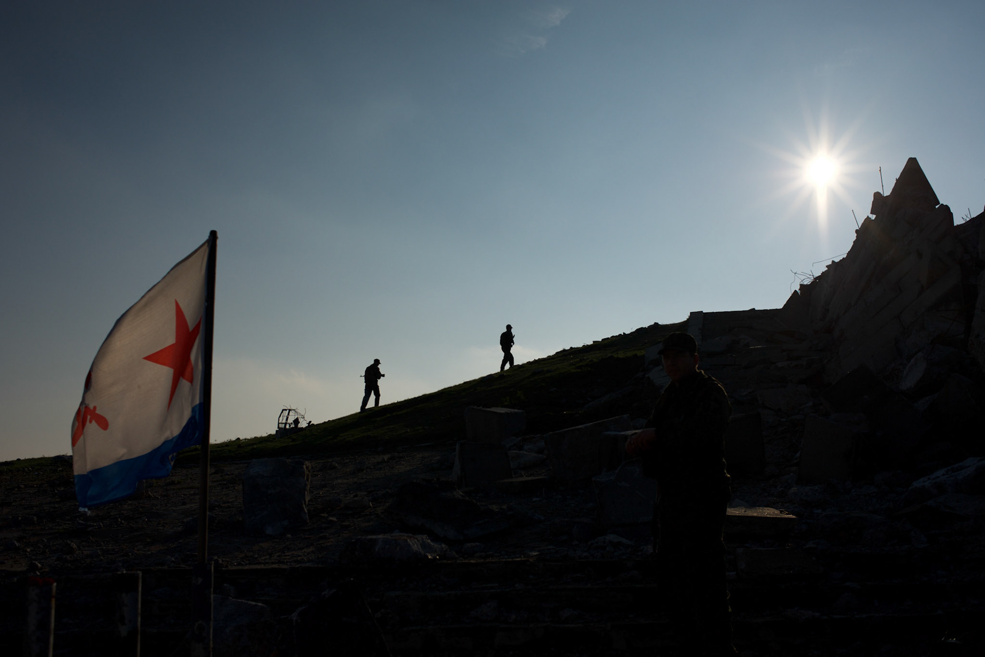 Separatist fighters on patrol in Savur-Mohyla, a Second World War monument close to the Russian border, near Snizhne.