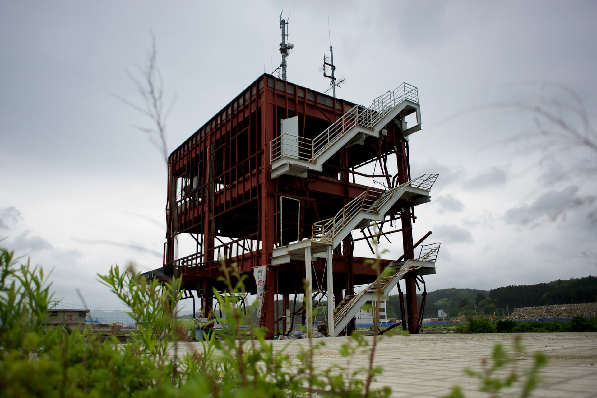 Damaged structure of the former tsunami alert centre in Minamisanriku, one of the few remaining buildings standing after the 2011 tsunami that destroyed 95 per cent of the town and many other locations in northeast Japan. Only the tallest buildings remained and roughly half the population was unaccounted for during the days following the disaster. Around 10 thousand people only were confirmed alive and evacuated in the first week. However, in late June 2011, a total of 1206 were counted as dead or missing.