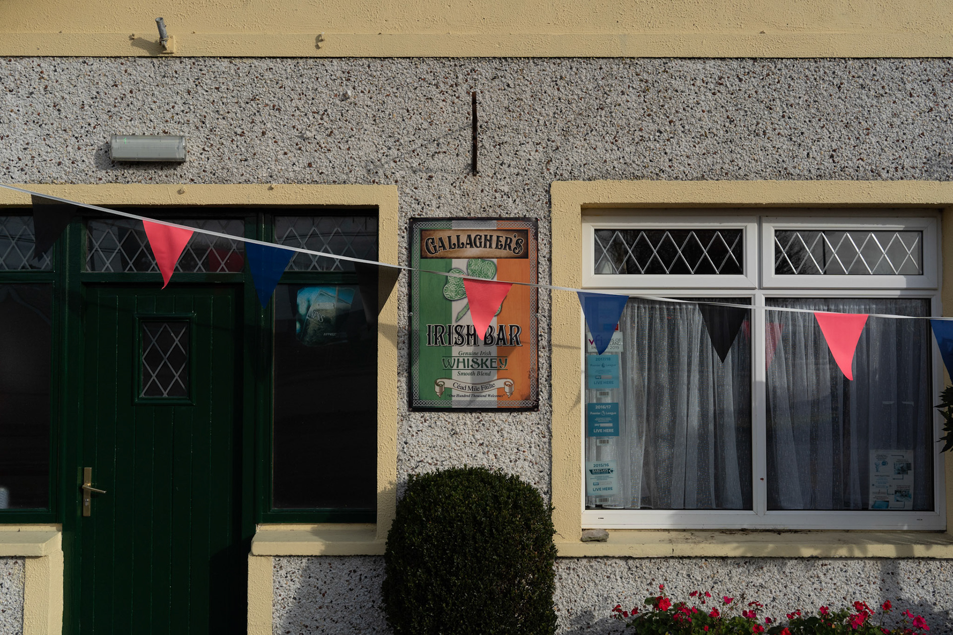 PULLOUGH, IRELAND - NOVEMBER 10, 2021: The facade of Gallagher’s pub in Pullough, a small village in County Offaly, Ireland, where Joe Gallagher, a former monk, receives people who visit him looking for treatment for various ailments. Joe, known for having faith healing powers since young age, is a seventh son. Faith healers have been around since antiquity and many Irish believe that certain people have God-given gifts to cure diseases. According to old Irish folklore, the seventh son of a seventh son has special healing powers, however, others get ‘the cure’ passed on to them by a parent or an older relative. CREDIT: Paulo Nunes dos Santos for The New York Times