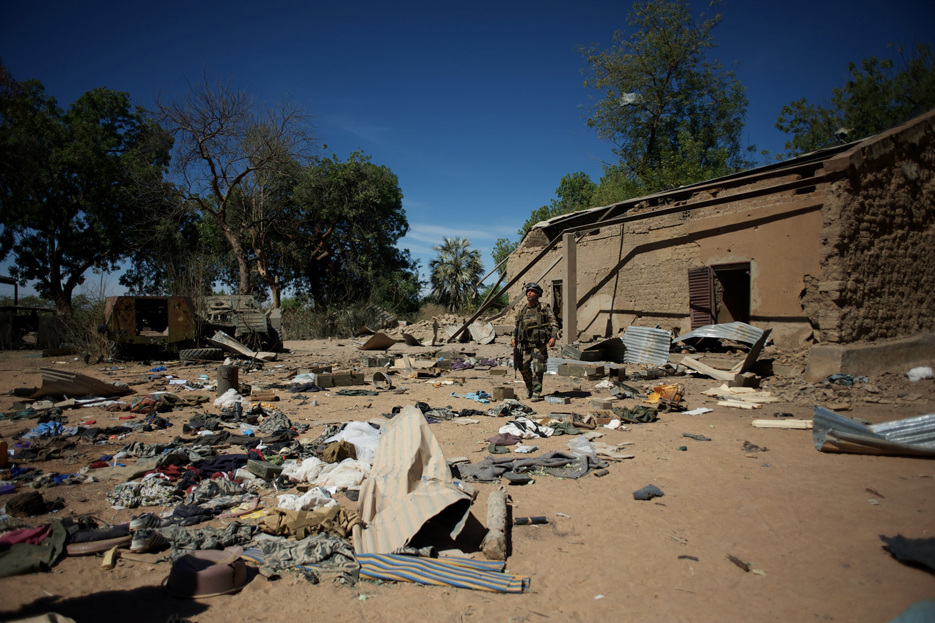 January 21, 2013 - Diabaly, Mali: A french army man checks the Mali military base in central Diabaly, for unexploded ordinance, a day after Mali government troops regain control of the city. Diabaly was under islamist militants control since the 14th of January.Several insurgent groups have been fighting a campaign against the Malian government for independence or greater autonomy for northern Mali, an area known as Azawad. The National Movement for the Liberation of Azawad (MNLA), an organisation fighting to make Azawad an independent homeland for the Tuareg people, had taken control of the region by April 2012.The Malian government pledge to the French army to help the national troops to stop the rebellion advance towards the capital Bamako. The french troops started aerial attacks on rebel positions in the centre of the country and deployed several hundred special forces men to counter attack the advance on the ground. (Paulo Nunes dos Santos)