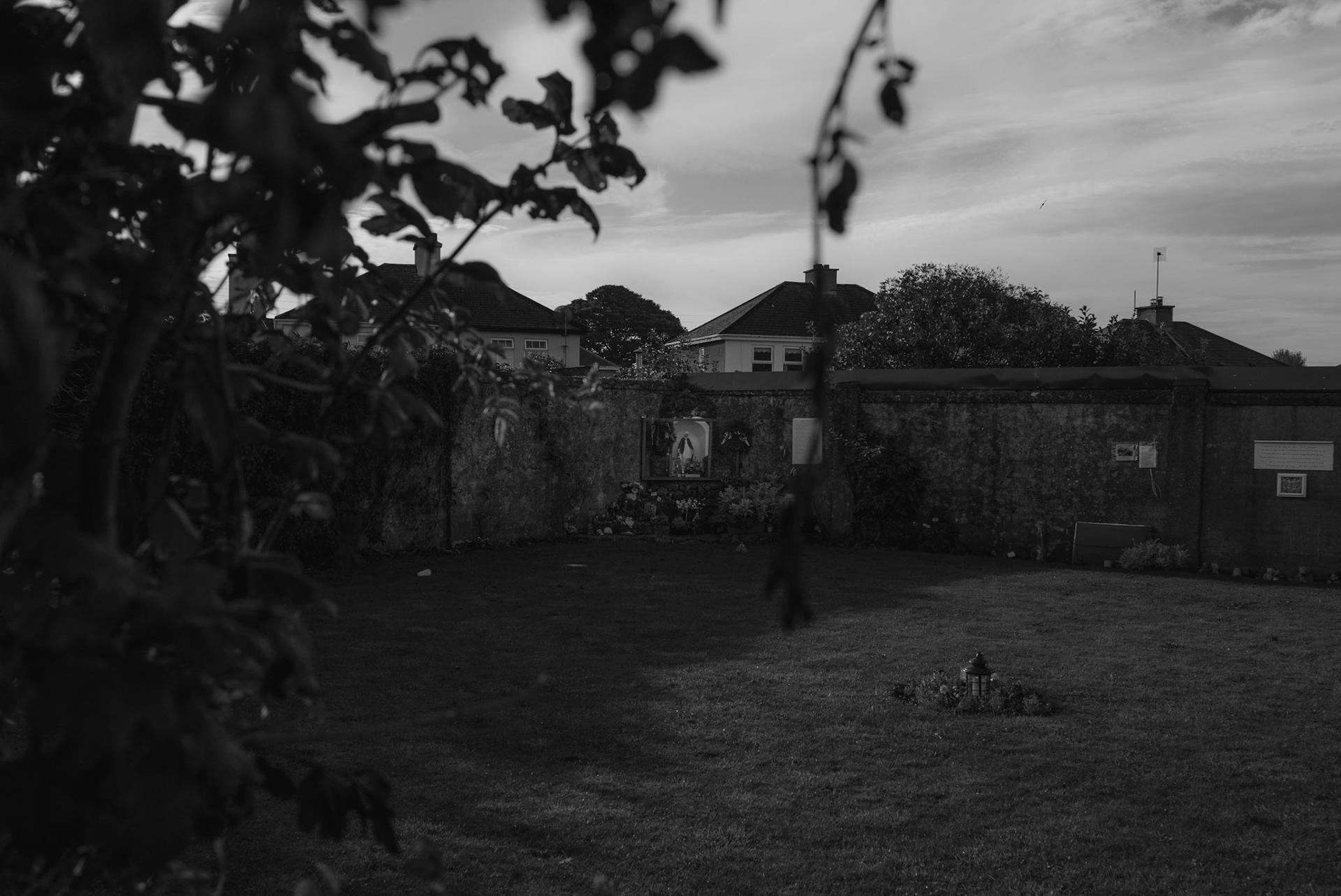 TUAM, IRELAND - SEPTEMBER 28, 2022: View of the site of the former St. Mary’s Mother and Baby Home, a former maternity home for unmarried mothers and their children run by the Bon Secours order in Tuam, Ireland, on September 28, 2022. In 2014, local historian, Catherine Corless, went public with information concerning the deaths of 798 children at the institution. Corless' research led her to conclude that almost all had been buried in an unmarked and unregistered site at the Home. Subsequent excavations carried out by an Irish government appointed Commission, found a significant quantity of human remains in a vault with twenty chambers, believed to be part of an old septic tank from the period the site was use as a workhouse. CREDIT: Paulo Nunes dos Santos for The New York Times