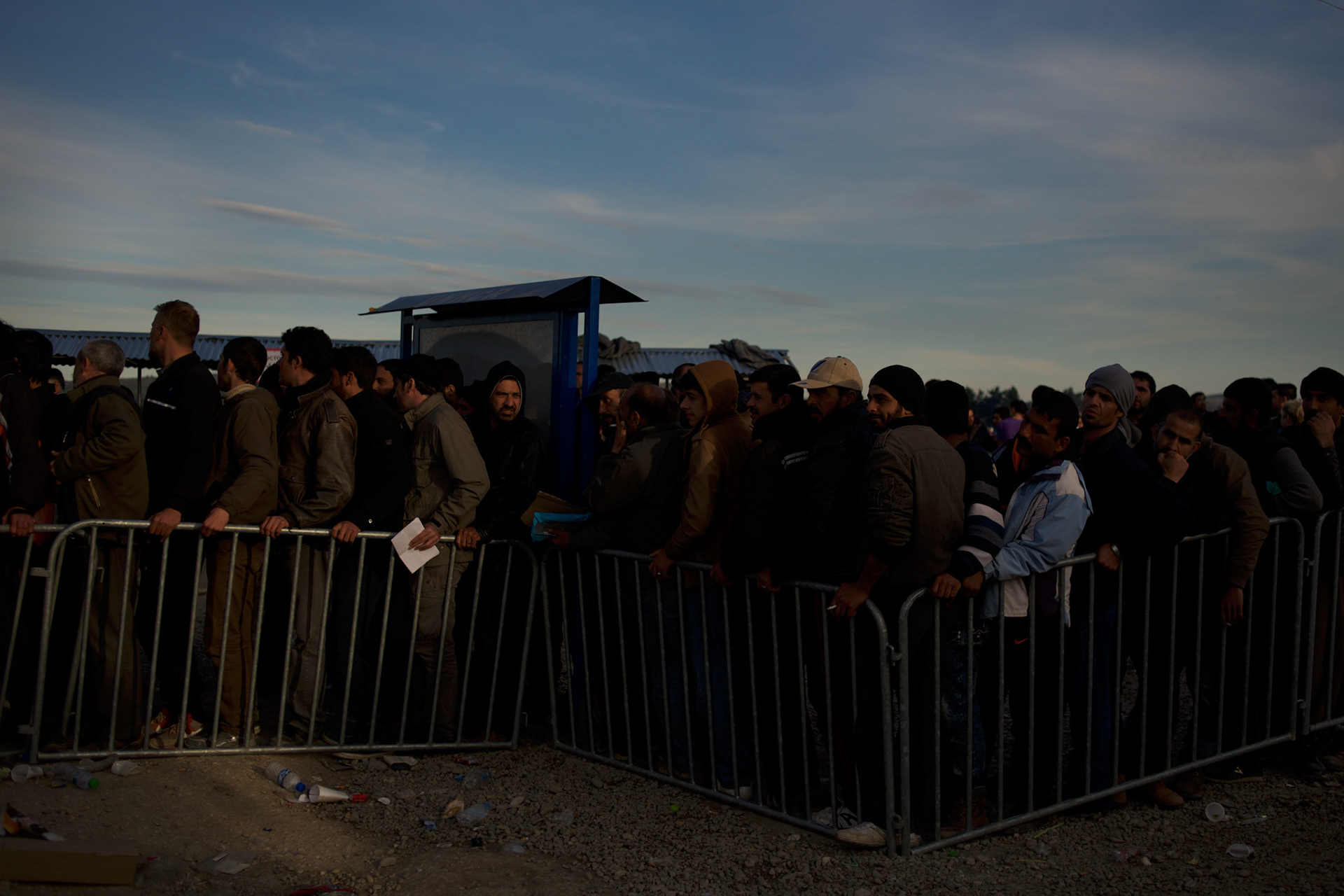Migrants and refugees queue for registration on arrival at the border between Greece and Macedonia in Idomeni, Greece. Around 13,000 migrants and refugees, mostly from the Middle East and African nations, are believe to be stranded here awaiting a chance to proceed their journey towards Germany and other northern European countries.