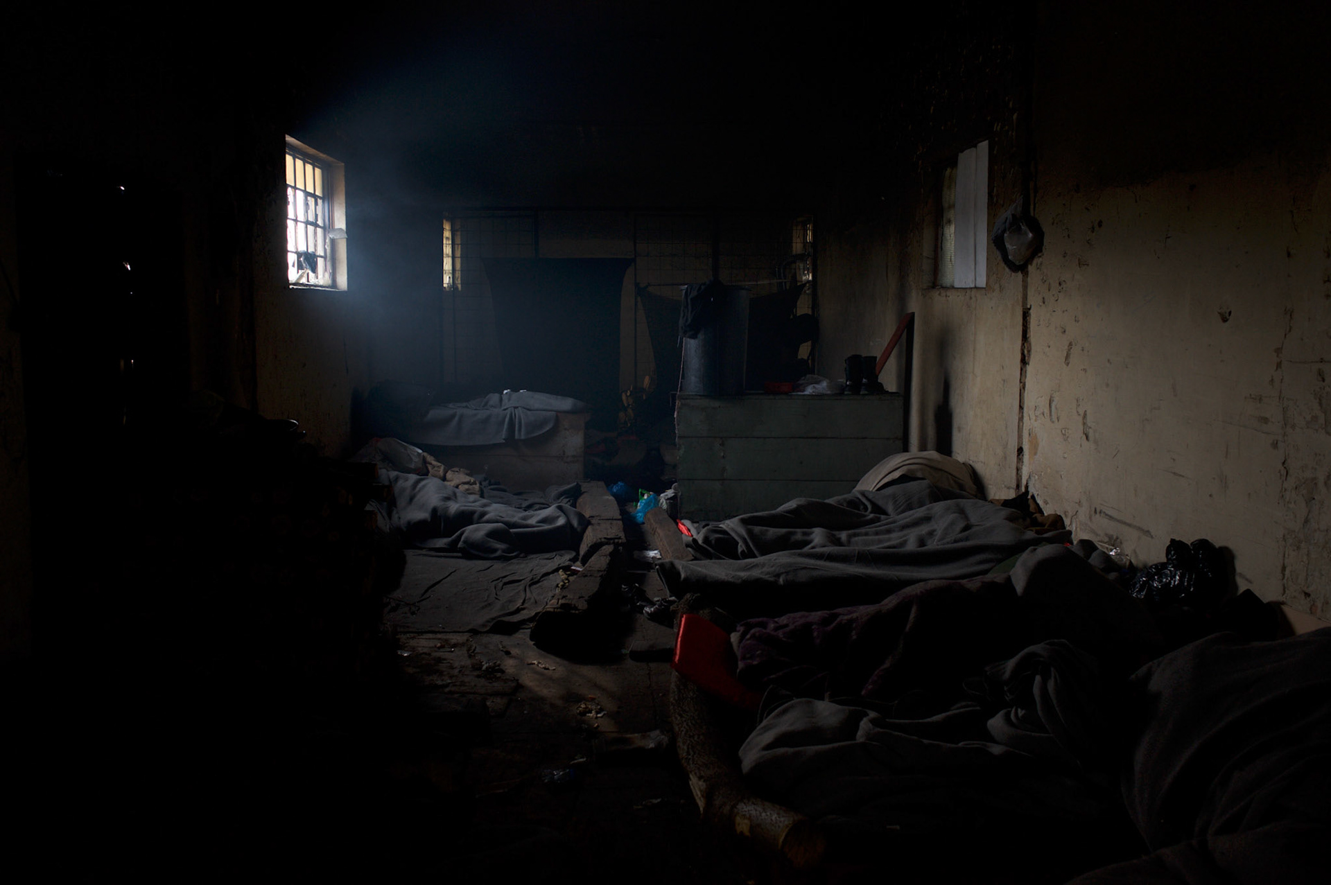General view of a sleeping area in one of the old warehouses near Belgrade's main railway and bus stations.