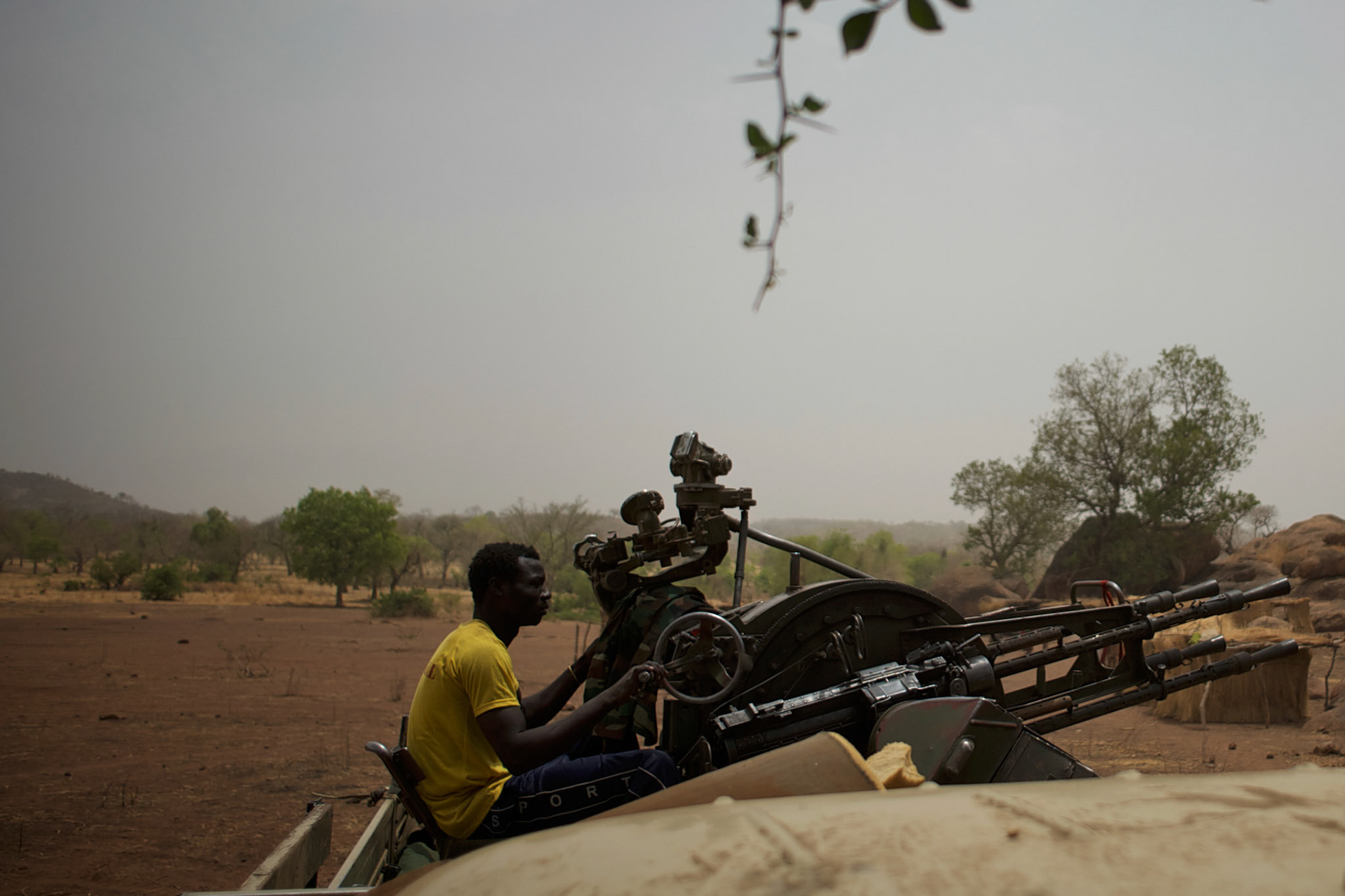 A Sudan People's Liberation Movement (SPLA-N) rebel fighters handles an anti-aerial weapon as the group take defensive position in Jebel Kwo military base, ahead of an attack on Sudan's Armed Forces (SAF) positions near Tess village in the rebel-held territory of the Nuba Mountains in South Kordofan.