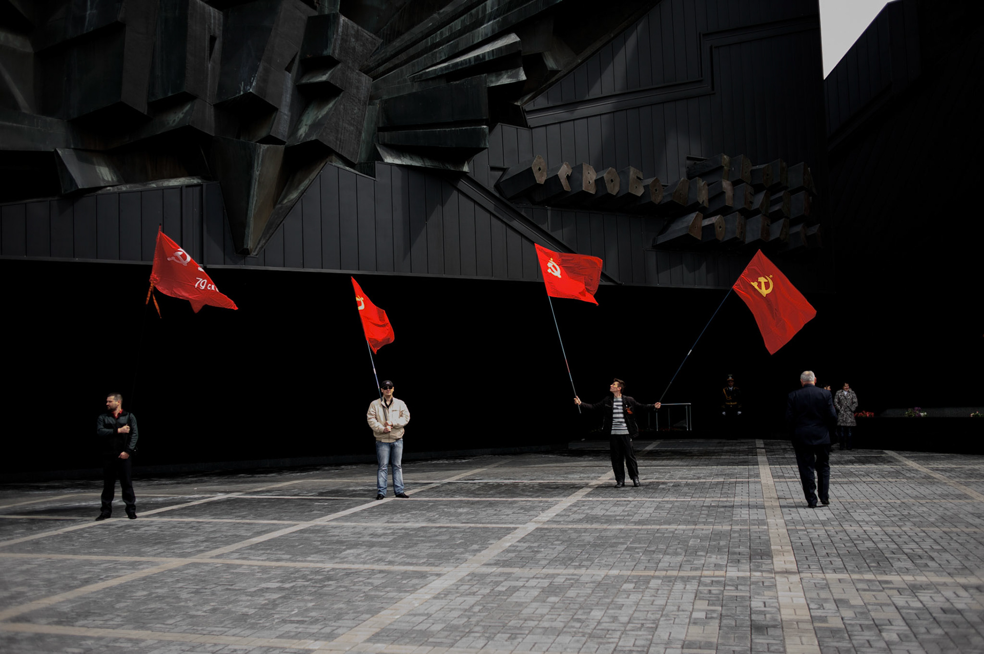 Pro-Russia Ukrainians wave Soviet Union flags during V-Day commemorations in Donetsk.