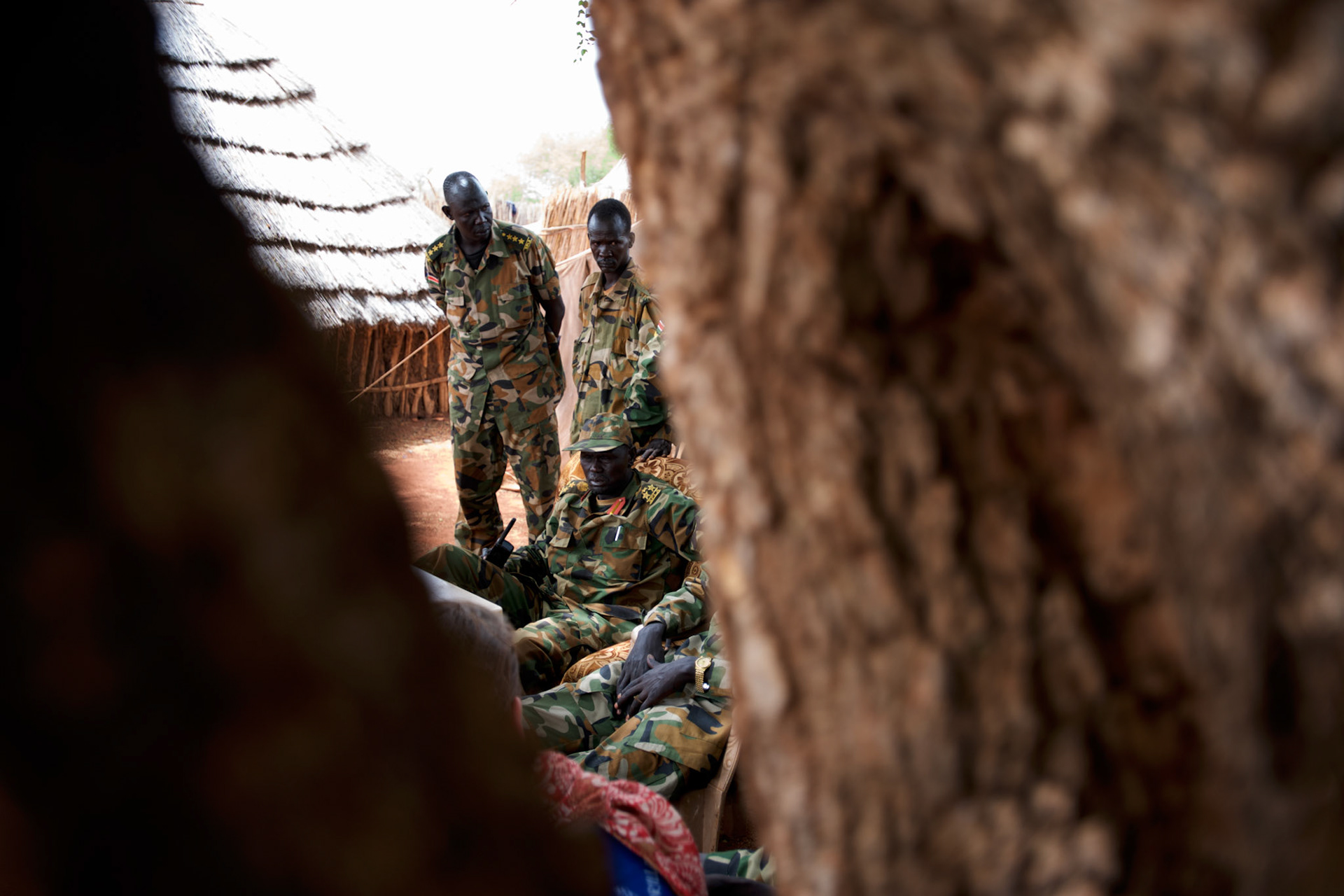 Sudan People's Liberation Army (SPLA) commanders talk to journalists, in a military base outside Bentiu in South Sudan, during the conflict with the neighbouring Sudan over the control of oil fields in a disputed border area.