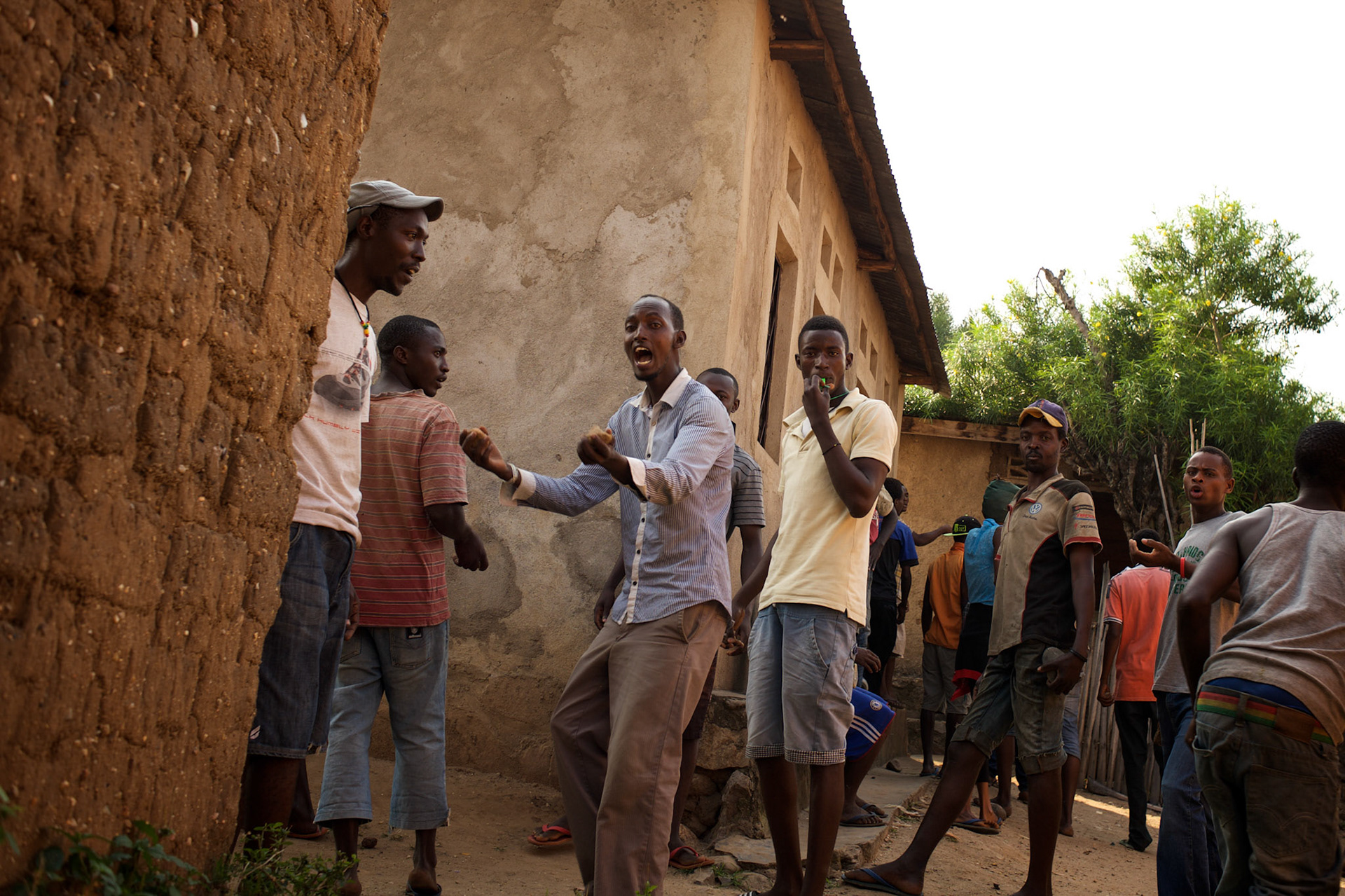 Demonstrators in Musaga, a district in Burundi's capital Bujumbura that has been at the heart of violent protests against the presidents third term bid, react to sustained automatic fire allegedly fired by police forces.