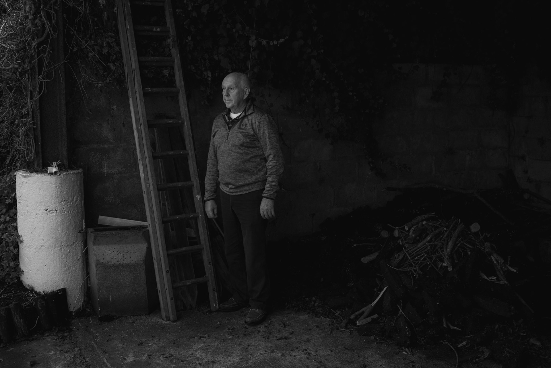 BALLYNAMONA, IRELAND - OCTOBER 14, 2022: PJ Haverty, a former resident of St. Mary’s Mother and Baby Home in Tuam, posing for a portrait in his house in Ballynamona, a small locality near Tuam, Ireland, on October 14, 2022. Mr Haverty is one of the many "home babies" who spent his early years at the maternity home for unmarried mothers and their children run by the Bon Secours order in Tuam. In 2014, Catherine Corless, a local historian, went public with information concerning the deaths of 798 children at the institution. Corless' research led her to conclude that almost all had been buried in an unmarked and unregistered site at the Home. Subsequent excavations carried out by an Irish government appointed Commission, found a significant quantity of human remains in a vault with twenty chambers, believed to be part of an old septic tank from the period the site was use as a workhouse. CREDIT: Paulo Nunes dos Santos for The New York Times