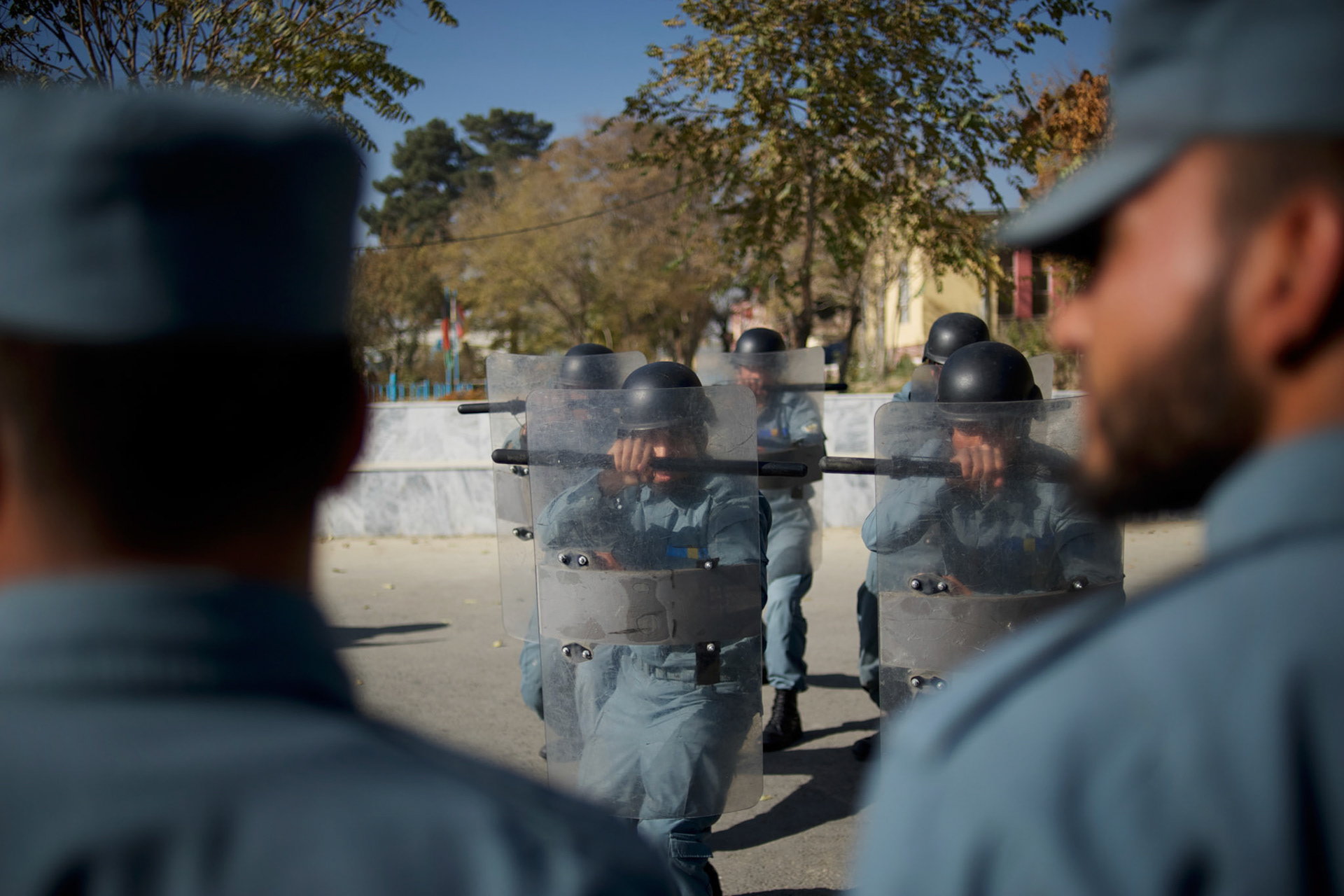 Afghan National Police (ANP) cadets train riot control during morning exercises at the Afghan Nacional Police Academy in Kabul.