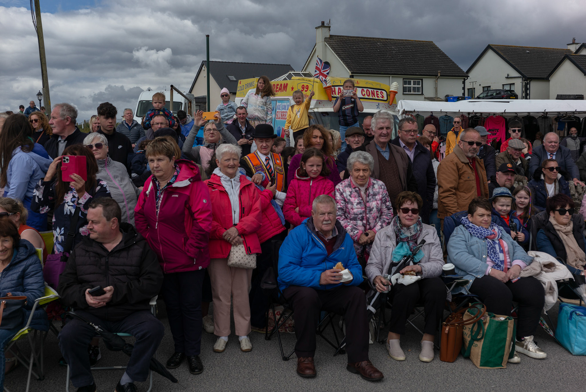 People watch as several marching flute bands and Orangemen take part in the annual Orange Order parade at Rossnowlagh Beach in Co. Donegal, Ireland, on July 6, 2024. Around 50 Orange lodges from Ireland and Northern Ireland paraded down a country lane toward the seaside village of Rossnowlagh on Saturday, the only annual Orange Order parade in the Republic of Ireland. Thousands attended the parade, which traditionally takes place on the Saturday before the main Twelfth demonstrations in Northern Ireland.