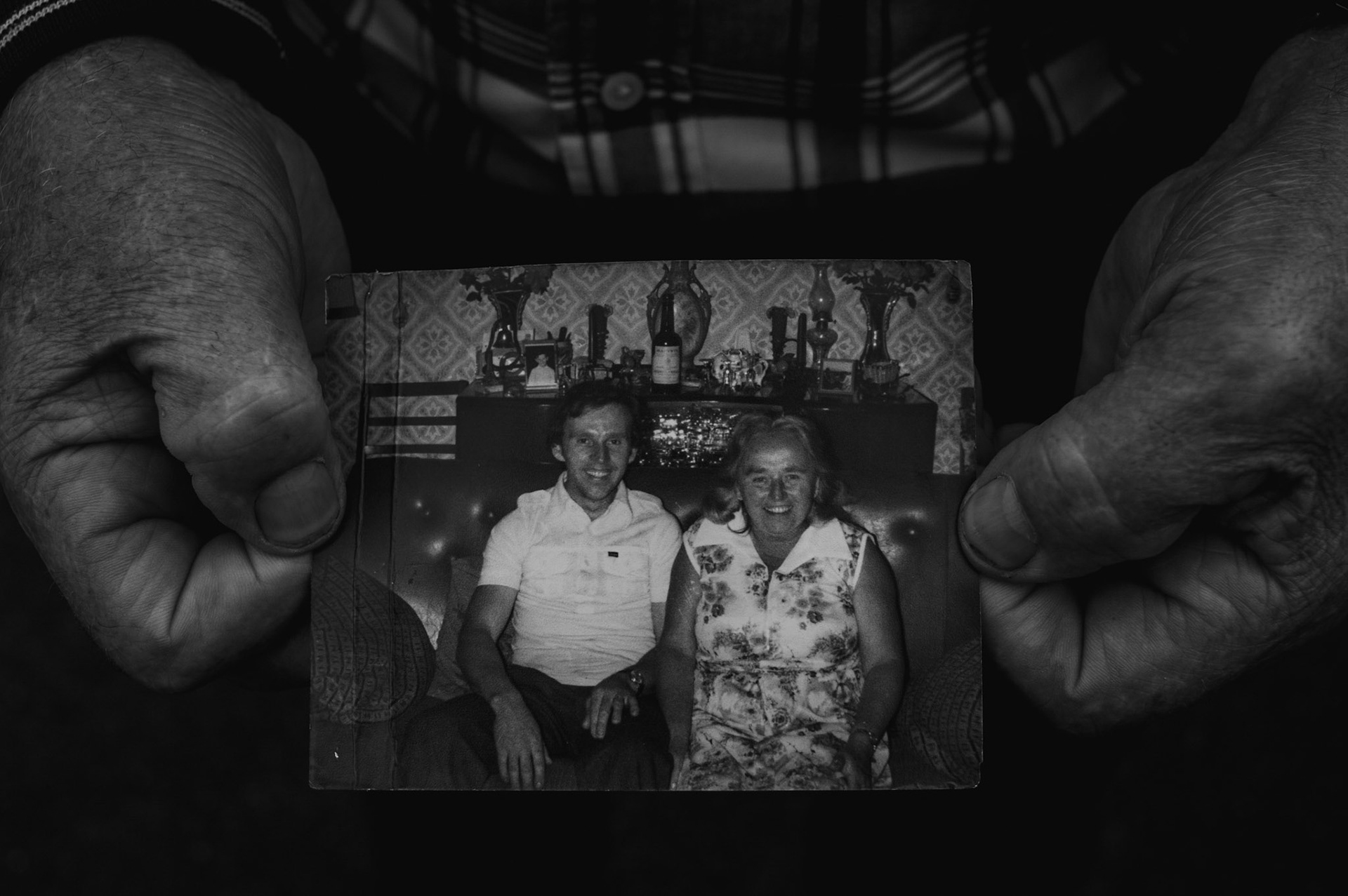 TUAM, IRELAND - AUGUST 24, 2017: PJ Haverty, a former resident of the St. Mary’s Mother and Baby Home in Tuam, holds a photograph taken in the day he met for the first time is birth mother. With the encouragement of his foster mother, in 1975 he made contact with his birth mother, Eileen, in Brixton, London, and met her on three occasions till she passed away. CREDIT: Paulo Nunes dos Santos for The New York Times