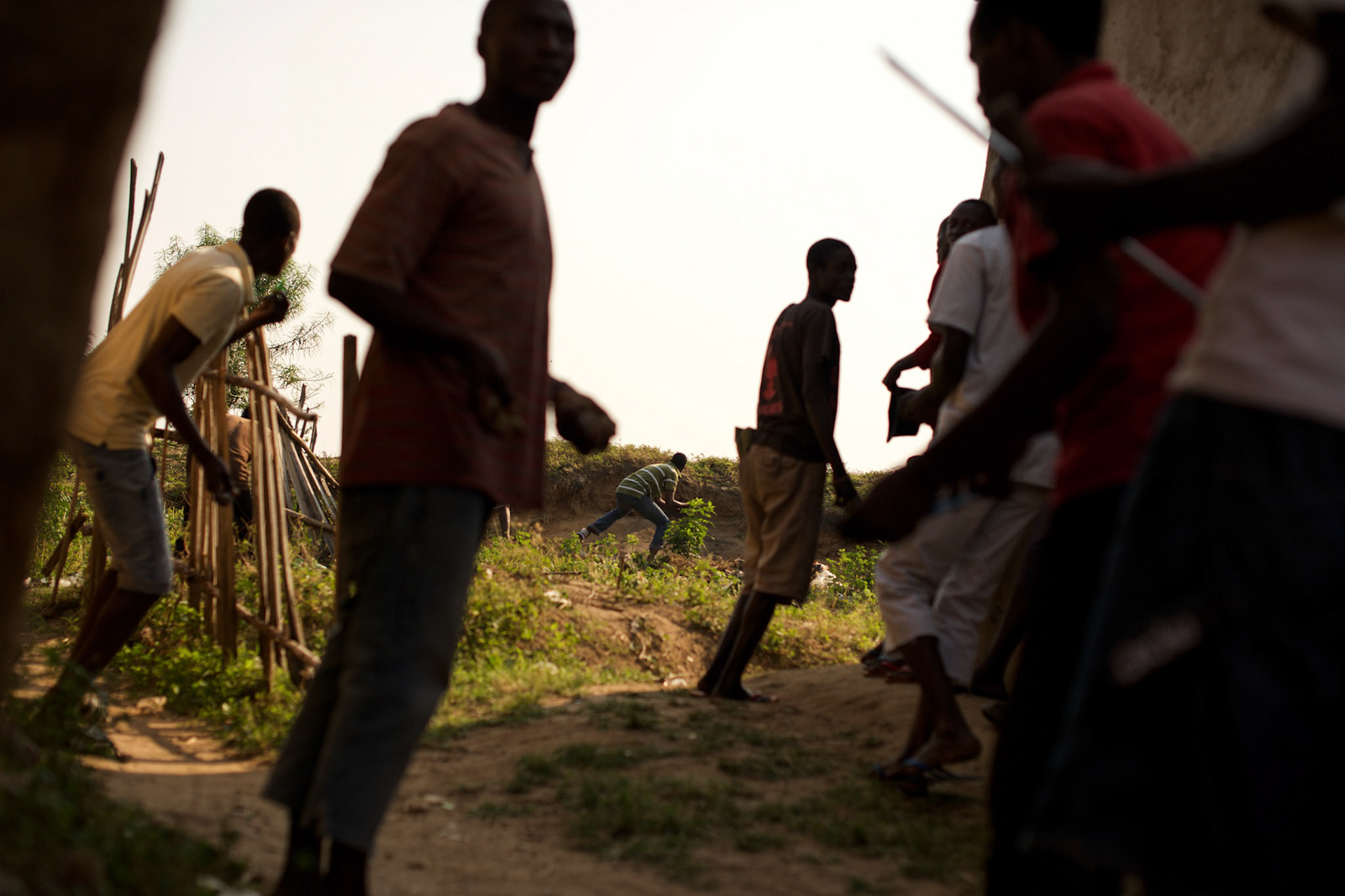 Demonstrators in Musaga, a district in Burundi's capital Bujumbura that has been at the heart of violent protests against the presidents third term bid, throw stones during sustained automatic fire allegedly fired by police forces.