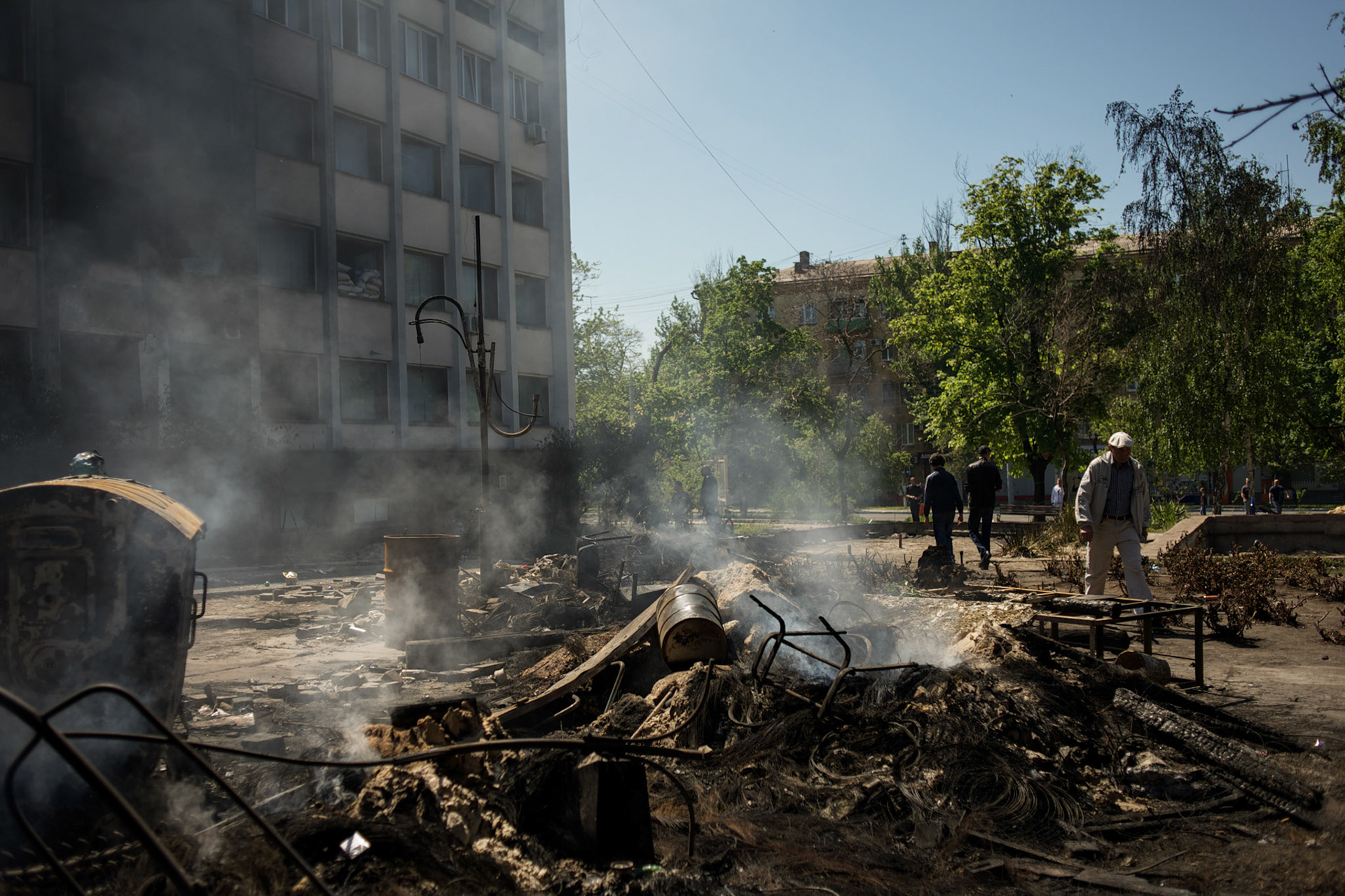 Burning debris outside a government building after clashes in Mariupol.