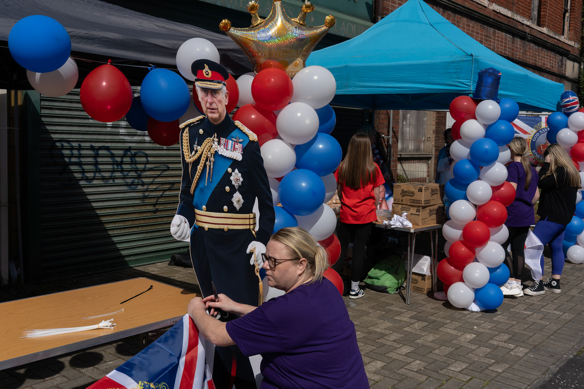 Locals set up a street party celebrating the coronation of King Charles III in Donegall Pass, a loyalist neighbourhood in central Belfast, Northern Ireland, on May 6, 2023.
