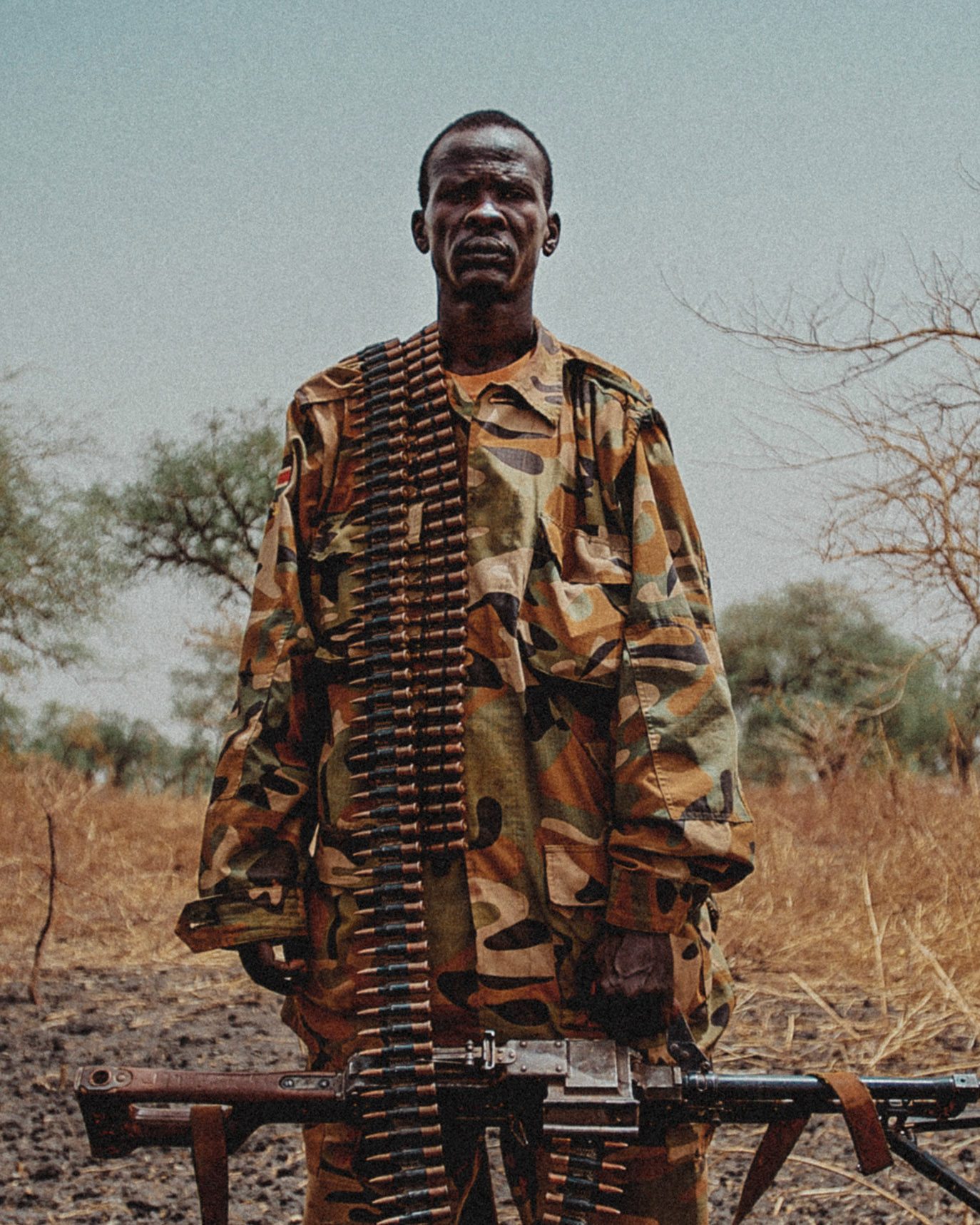 An SPLA soldier stands for a portrait at the frontline in South Sudan's Bentiu region during the conflict with the neighbouring Sudan over the control of oil fields in a disputed border area.