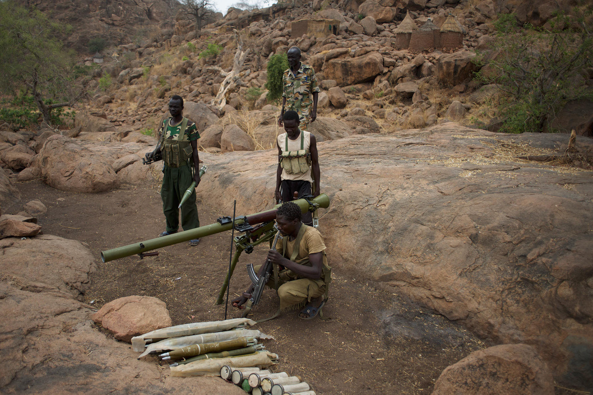 Sudan People’s Liberation Movement (SPLA-N) rebel fighters take defensive positions in Jebel Kwo military base, ahead of an attack on Sudan's Armed Forces (SAF) positions near Tess village in the rebel-held territory of the Nuba Mountains in South Kordofan.