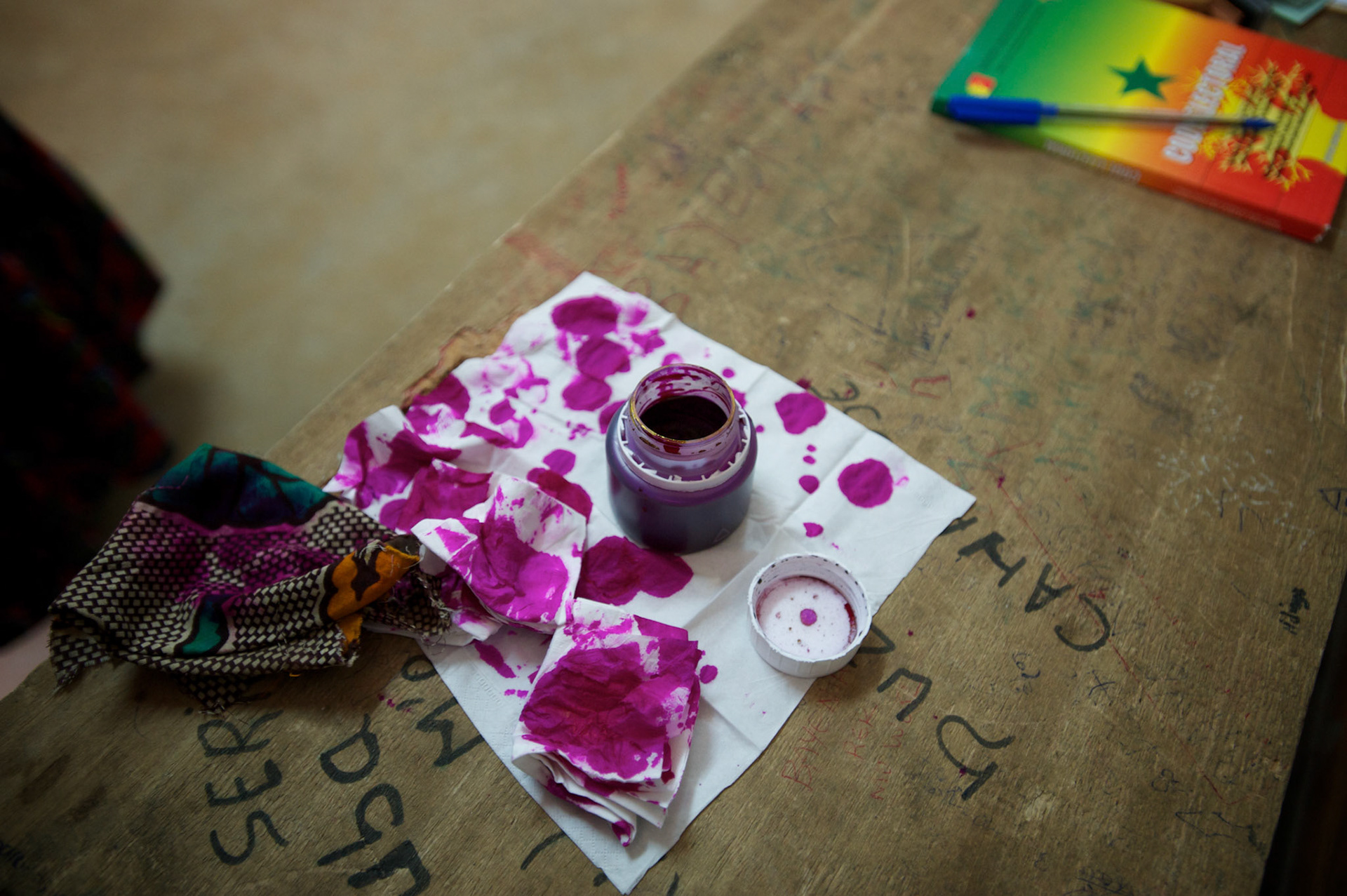 February 26, 2012 - Dakar, Senegal: A ink tub is seen on a voting table for the senegalese presidential elections at a polling station in Franco-Arab School in Point E area of Dakar. Hundreds arriving for voting in the early hours. (Paulo Nunes dos Santos/Polaris)
