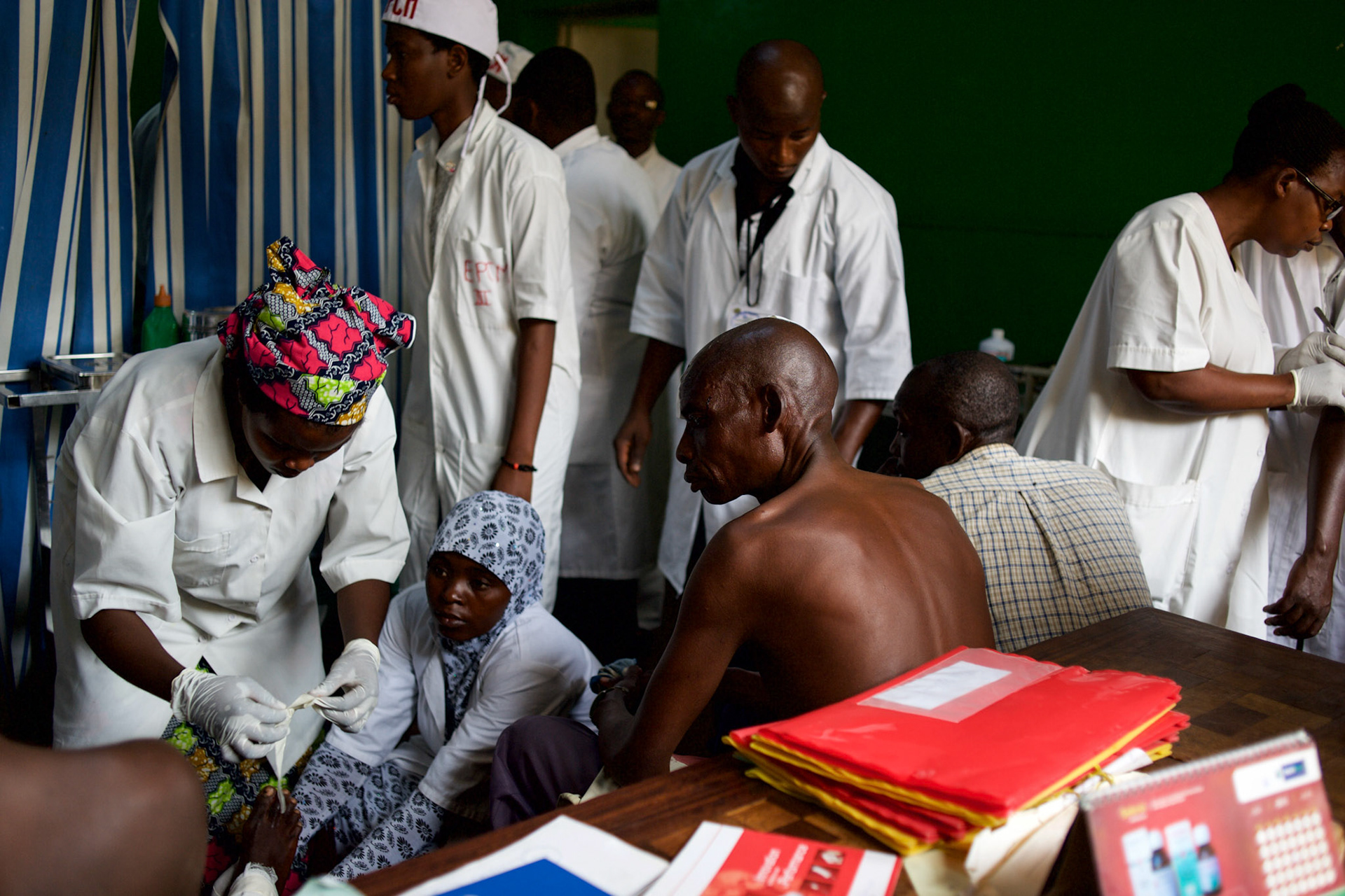 A victim of a grenade attack on a local shop in central Bujumbura, get's medical treatment at Prince Louis Rwagasore Clinic. Eight people were injured in the attack.