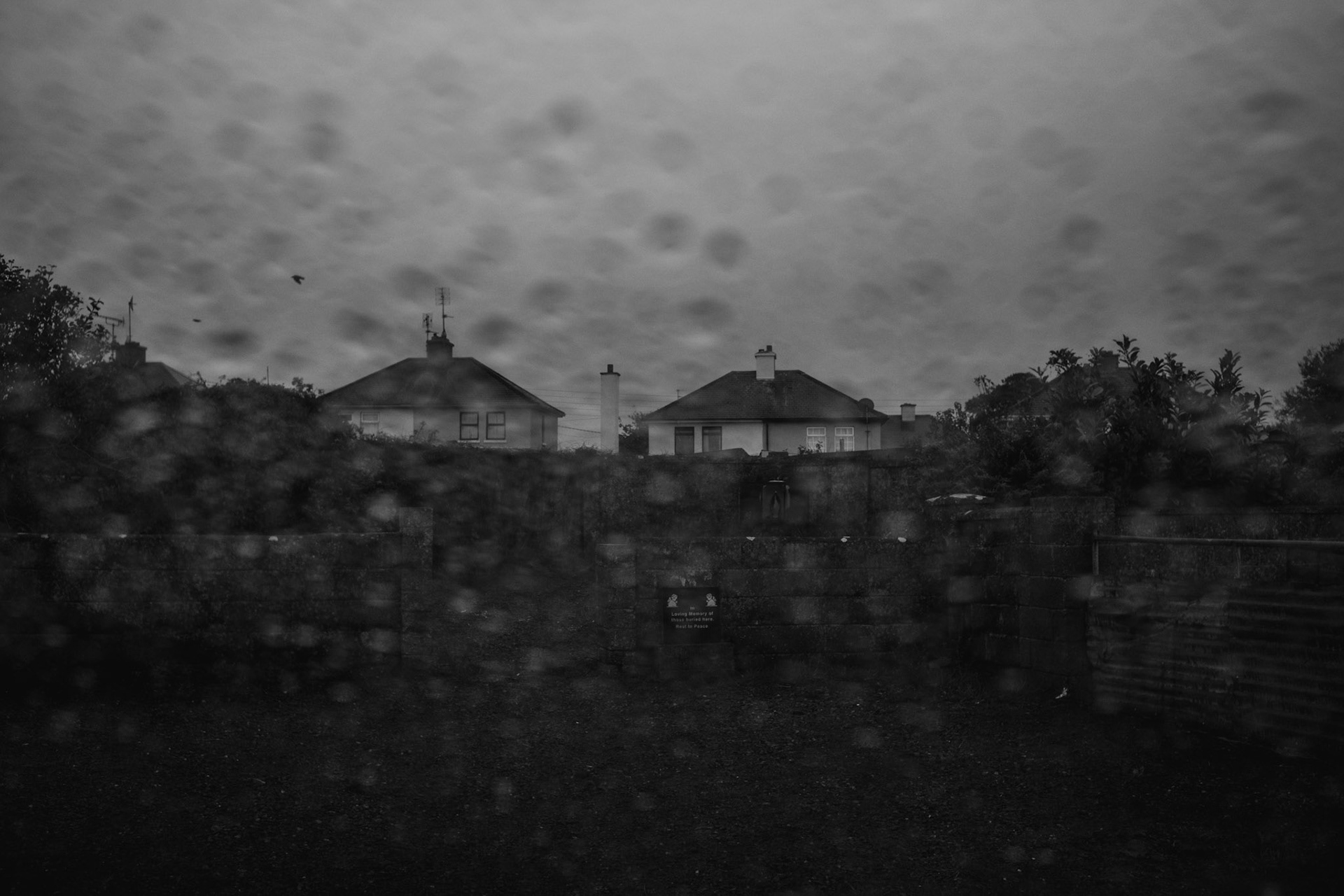 TUAM, IRELAND - OCTOBER 18, 2017: General view of the site where local historian Catherine Corless believes 796 children, most of them infants, were interred at St. Mary’s Mother and Baby Home between 1925 and 1961, in Tuam, Ireland. Despite the little attention paid to Corless’s claims at first, a state-financed investigation uncovered the remains of babies, small children and foetuses interred where she said they would. The access to the site recently reopened to the public after more than one year fenced by the authorities. CREDIT: Paulo Nunes dos Santos for The New York Times