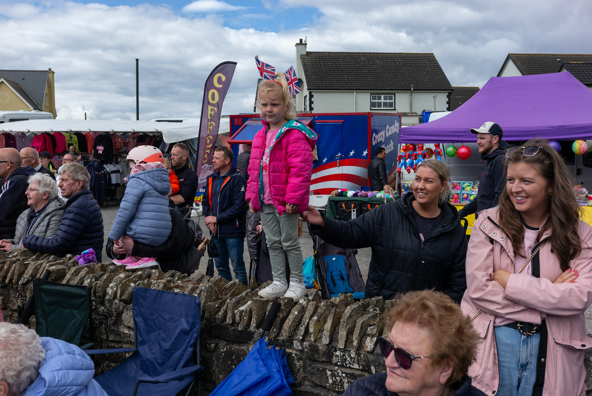 People watch as several flute bands march during the annual Orange Order parade at Rossnowlagh Beach in Co. Donegal, Ireland, on July 06, 2024. Around 50 Orange lodges from Ireland and across Northern Ireland paraded down a country lane towards the seaside village of Rossnowlagh on Saturday, the only annual Orange Order parade in the Republic of Ireland. Thousands of people have attended the annual Orange Order parade which traditionally takes place on the Saturday before the main Twelfth demonstrations in Northern Ireland.