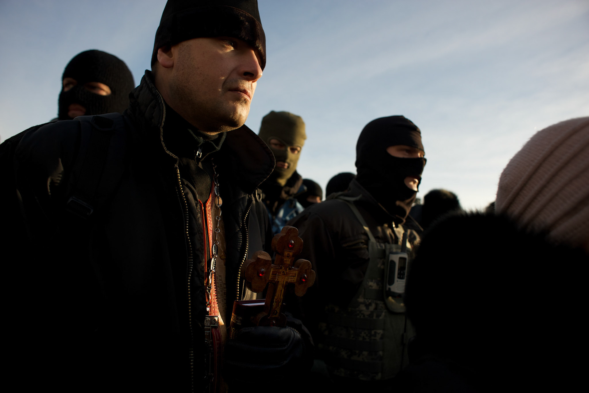 January 26, 2014 - Kiev, Ukraine: Thousands in Kiev mourn a protester shot dead during clashes with the Ukrainian riot police in Kiev, early in the week.An emotional crowd packed Saint Michael's Cathedral and spilled into a square outside to pay their last respects to 25-year-old Mikhail Zhiznevsky, with many waving Ukrainian flags with black ribbons. (Paulo Nunes dos Santos)