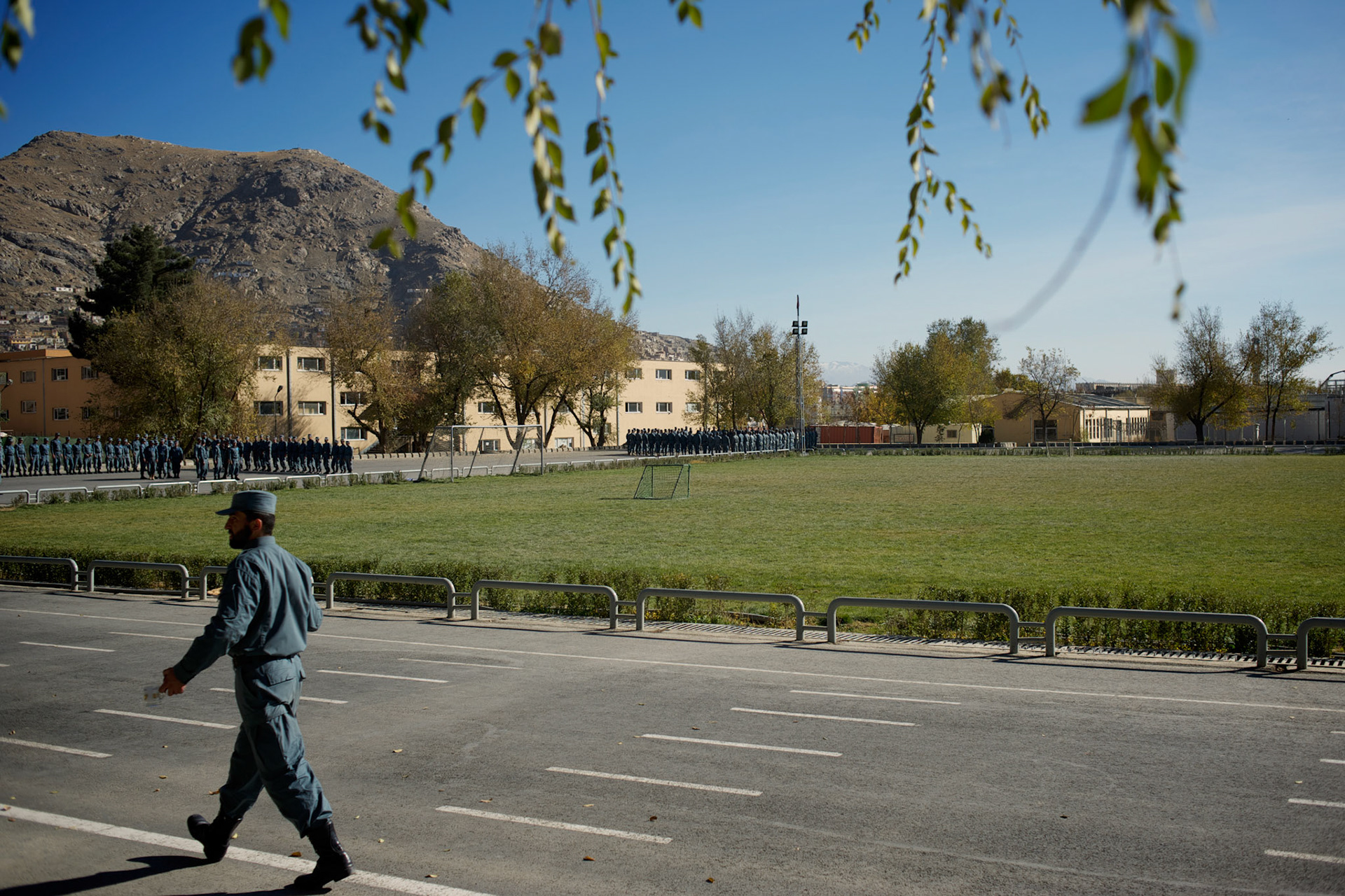 A Afghan National Police (ANP) commander passes by the exercise yard at the Afghan Nacional Police Academy in Kabul.