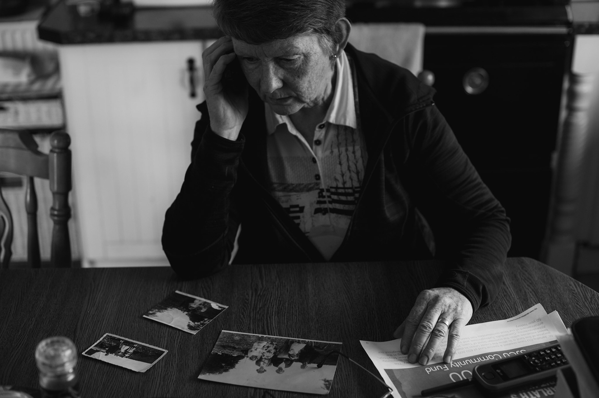 TUAM, IRELAND - SEPTEMBER 21, 2017: Local historian Catherine Corless attending a phone call in her house in the outskirts of Tuam, Ireland. Corless's investigation into a burial site in St. Mary’s Mother and Baby Home in Tuam, where she believed 796 children, most of them infants, were interred between 1925 and 196, proved to be right when a state-financed investigation uncovered the remains of babies, small children and foetuses interred where she said they would. CREDIT: Paulo Nunes dos Santos for The New York Times