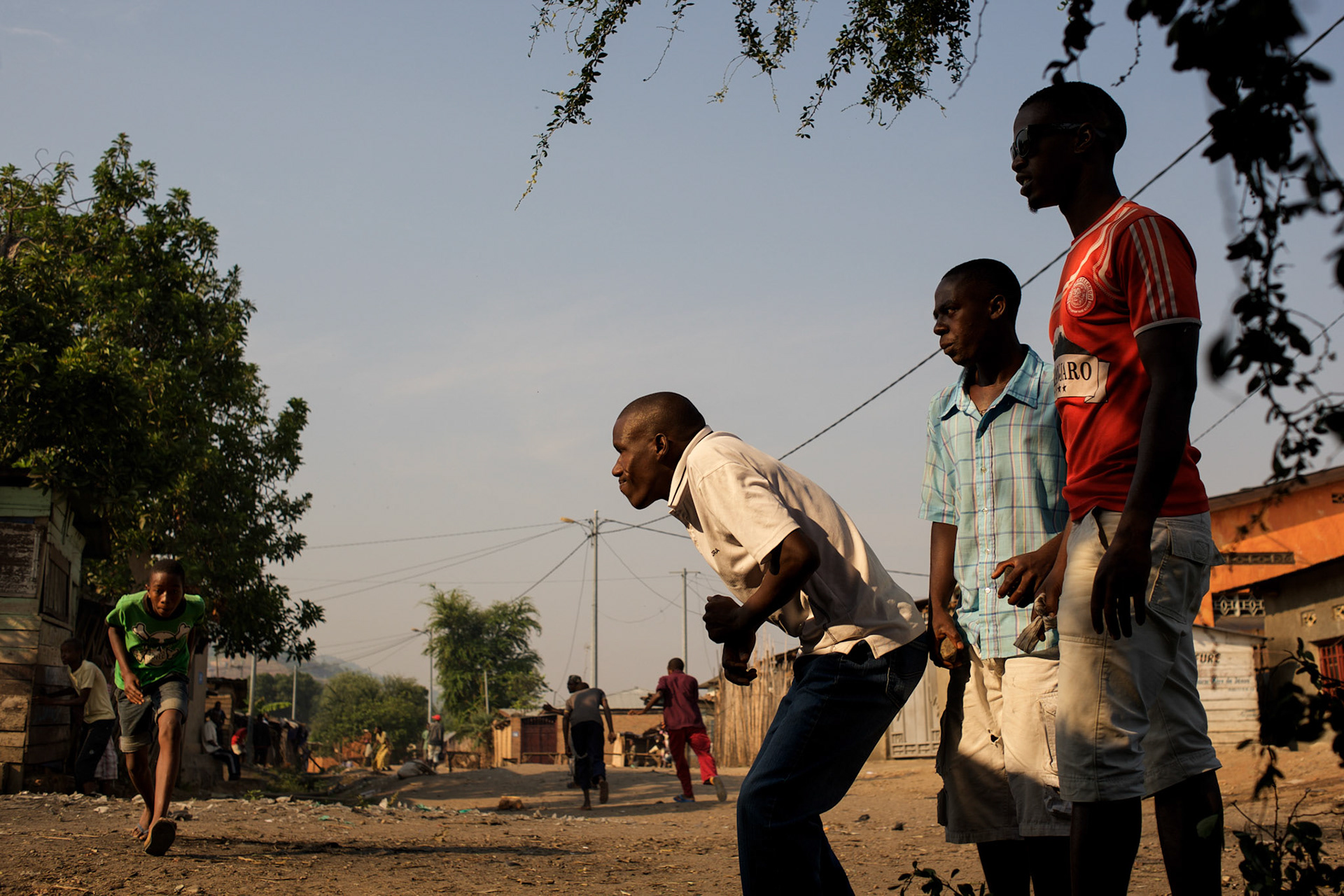 Demonstrators in Musaga, a district in Burundi's capital Bujumbura that has been at the heart of violent protests against the presidents third term bid, react to sustained automatic fire allegedly fired by police forces.