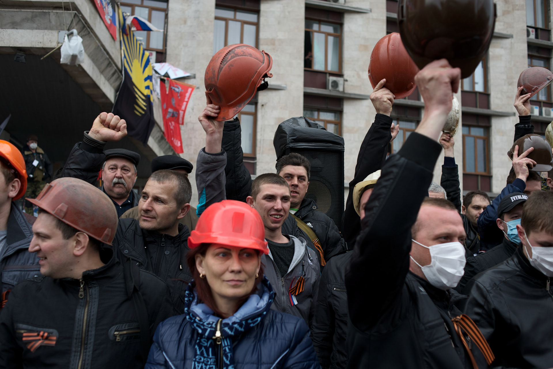 Coal miners show support for separatists occupying the Donbass regional government building in Donetsk.