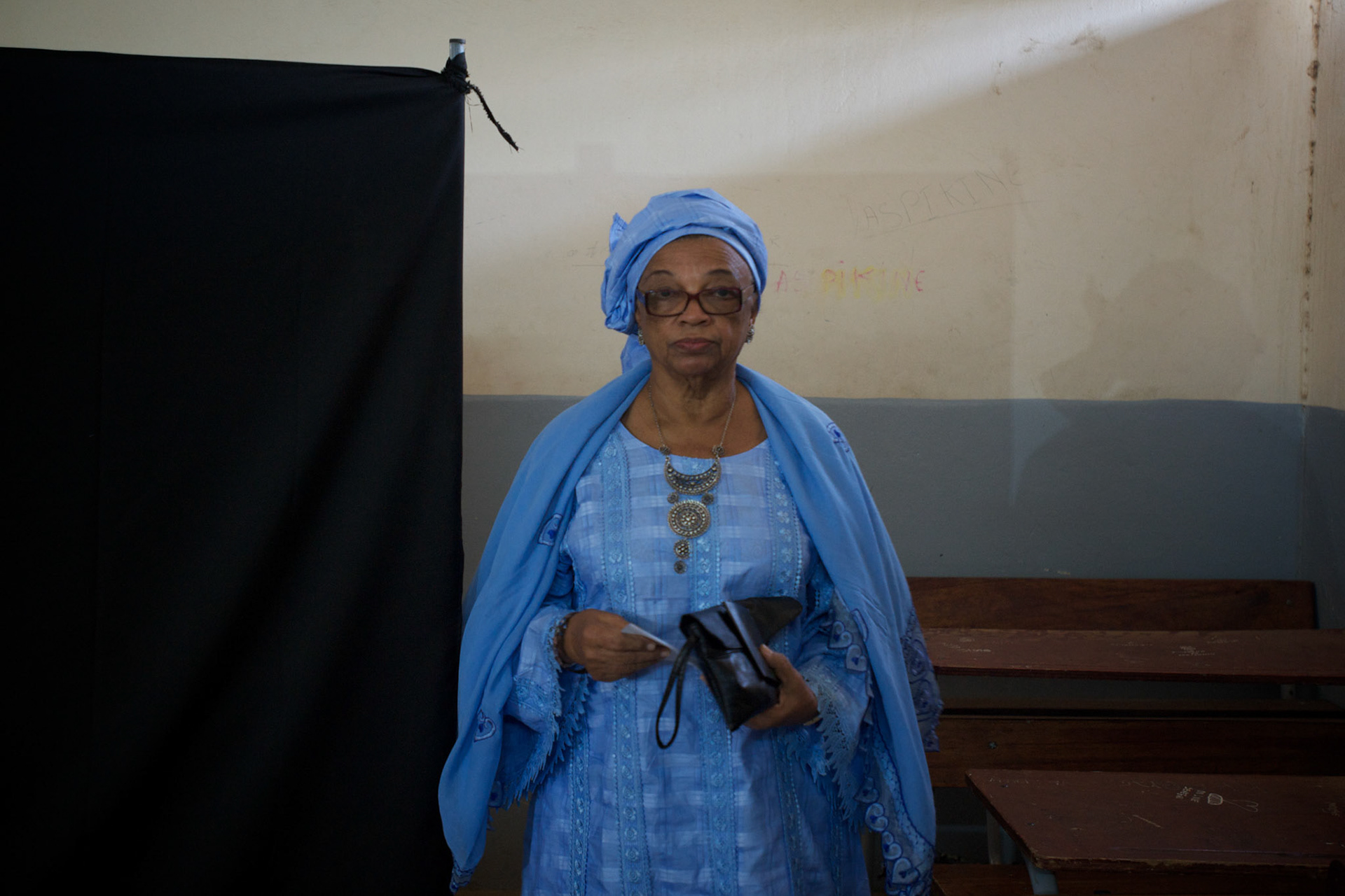 February 26, 2012 - Dakar, Senegal: A senegalese man leaves the voting ballot during the senegalese presidential elections at a polling station in Franco-Arab School in Point E area of Dakar. Hundreds arriving for voting in the early hours. (Paulo Nunes dos Santos/Polaris)