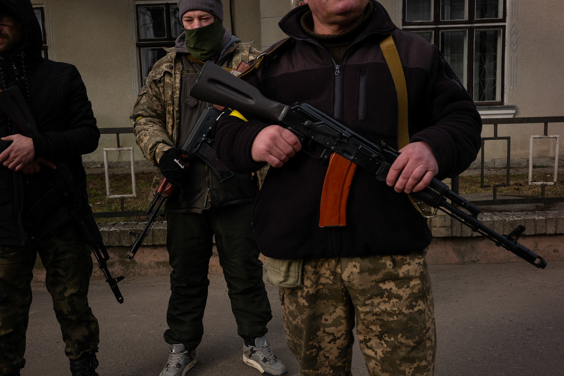 Members of a self-defense group take guard on a access road in an undisclosed village on the outskirts of Lviv.