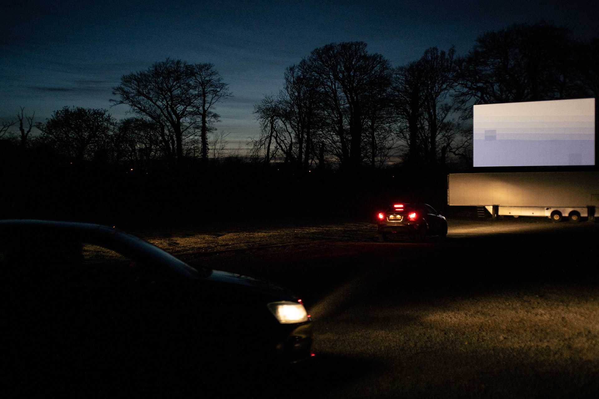 As the screening ends, cars leave in the same orderly fashion as they arrive. Dublin, Ireland - March 24, 2020.