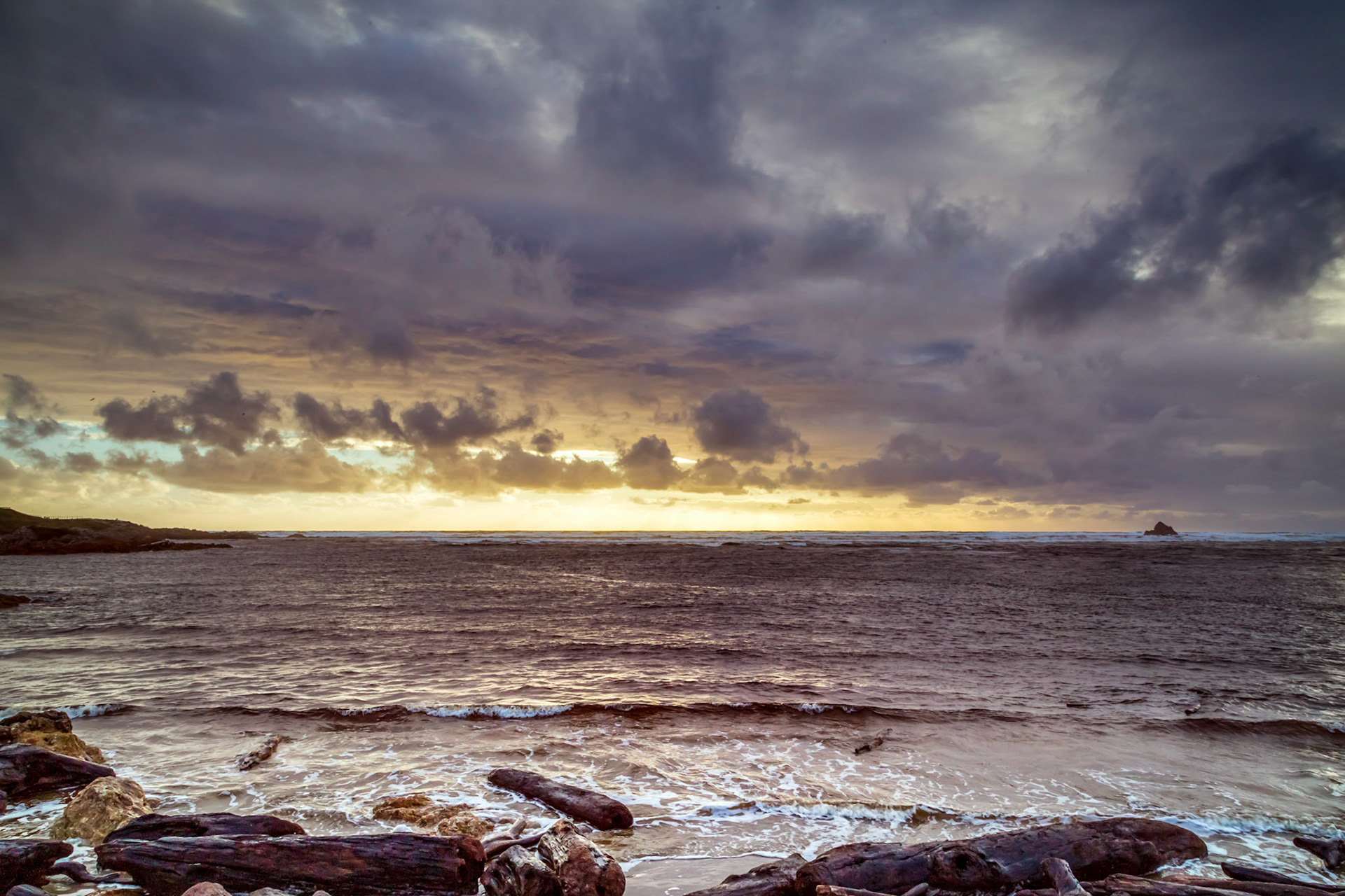 Setting sun in the West.At the Edge of the World; Arthur River.