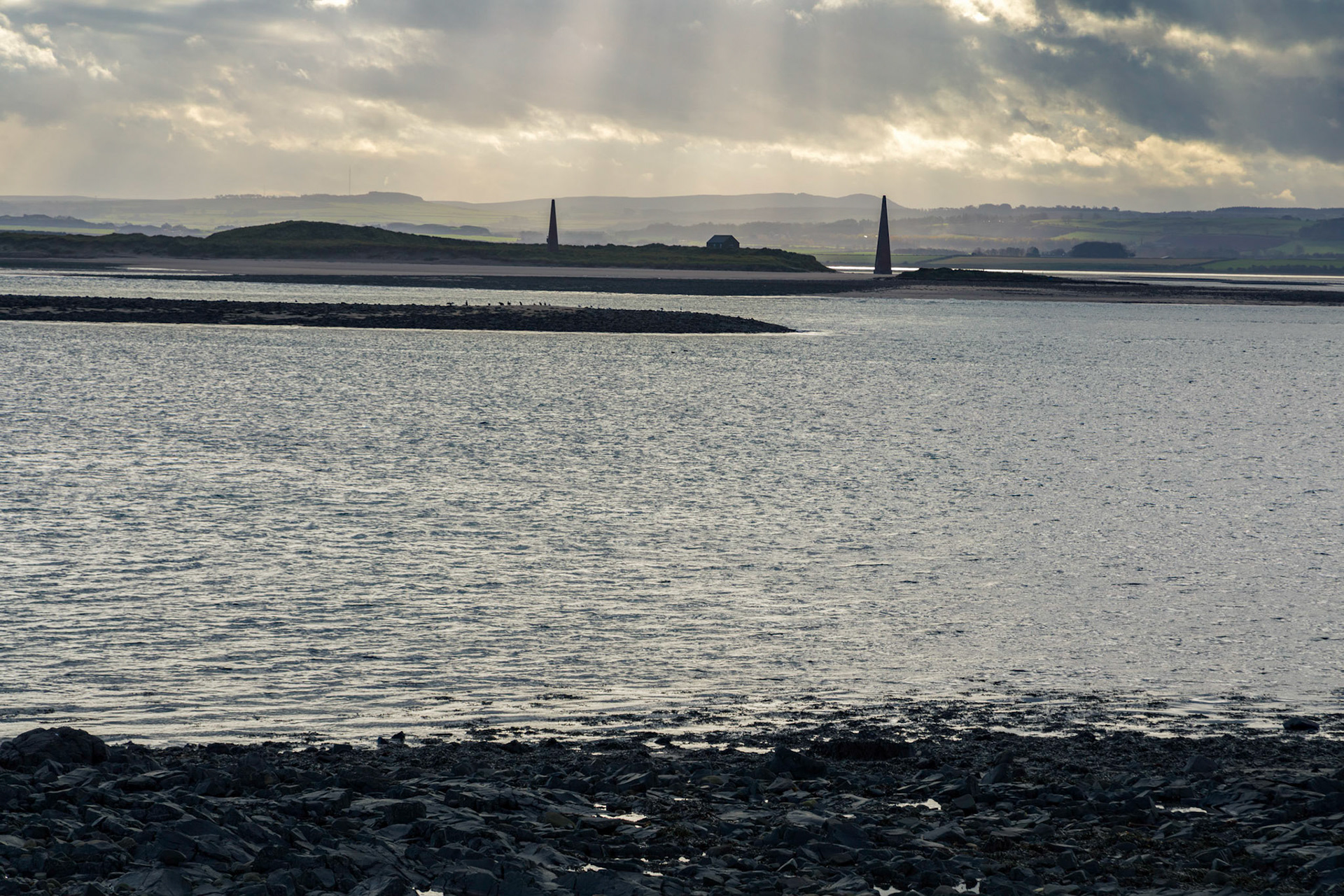 Lindisfarne inlet with channel navigation markers