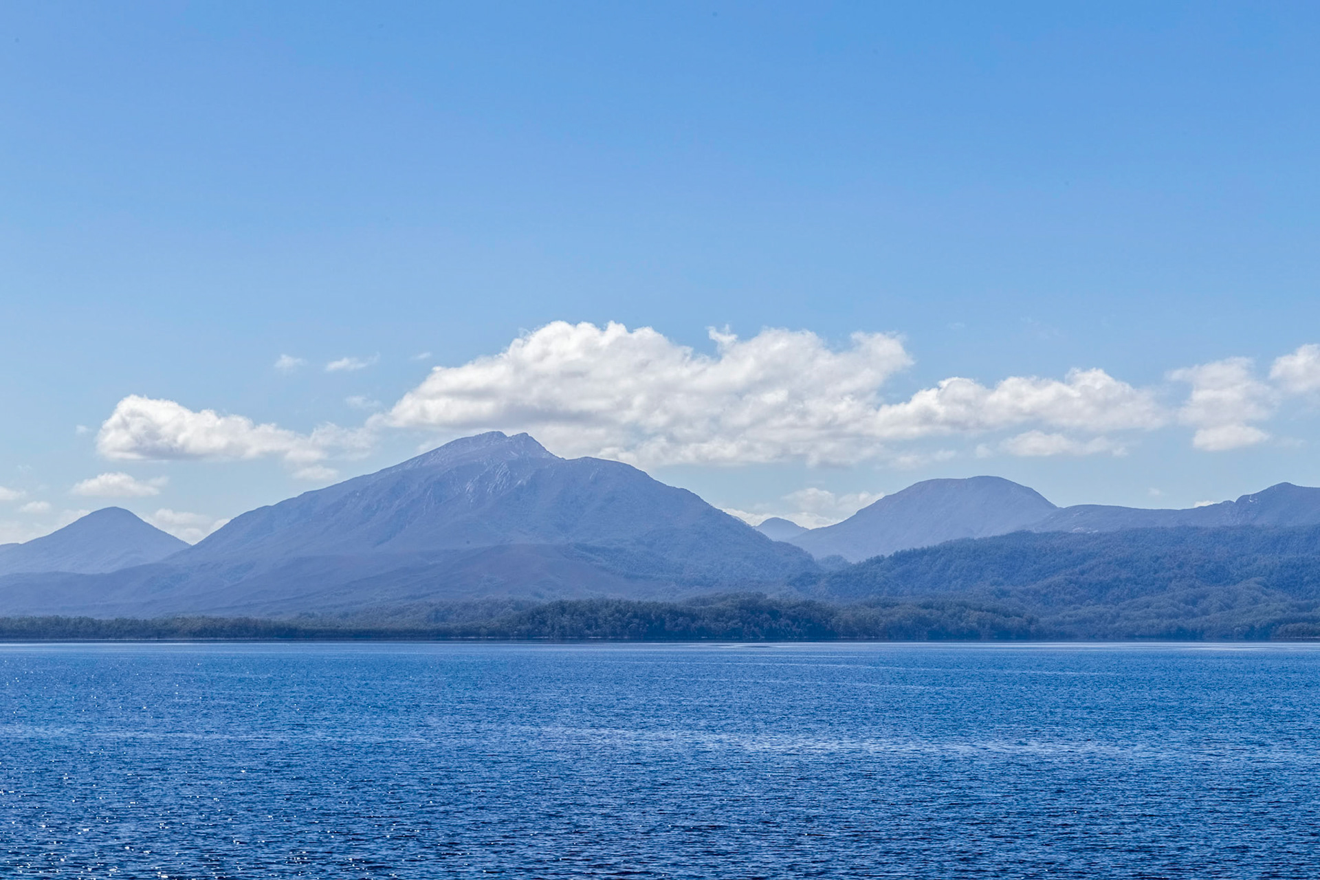 Mt Sorell (1144m) with Mount Dundas and Mount Darwin. From Macquarie Harbour.