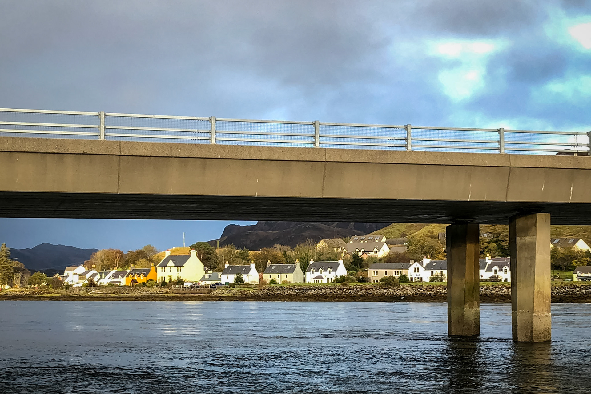 View of Dornie village from under the bridge (A87) over Loch Long