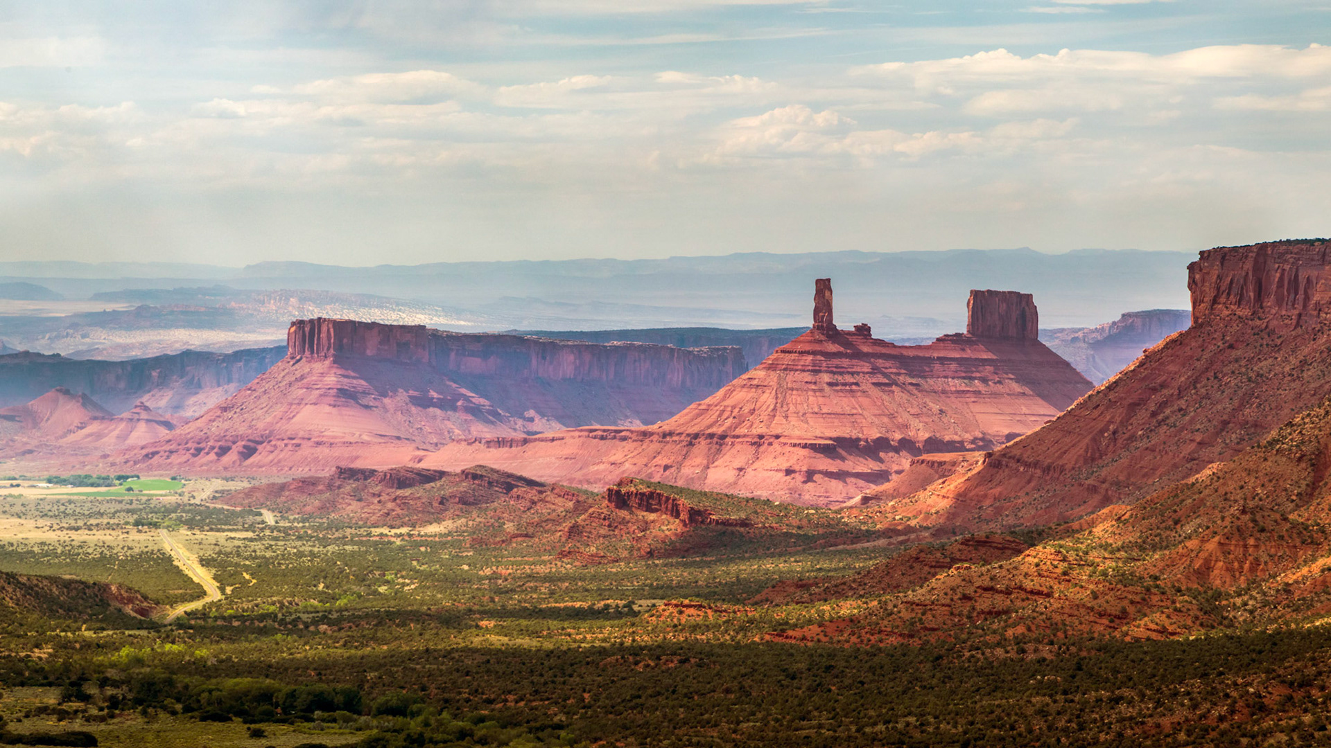 Looking down Castle Valley, with Castleton Tower and Parriott Mesa.