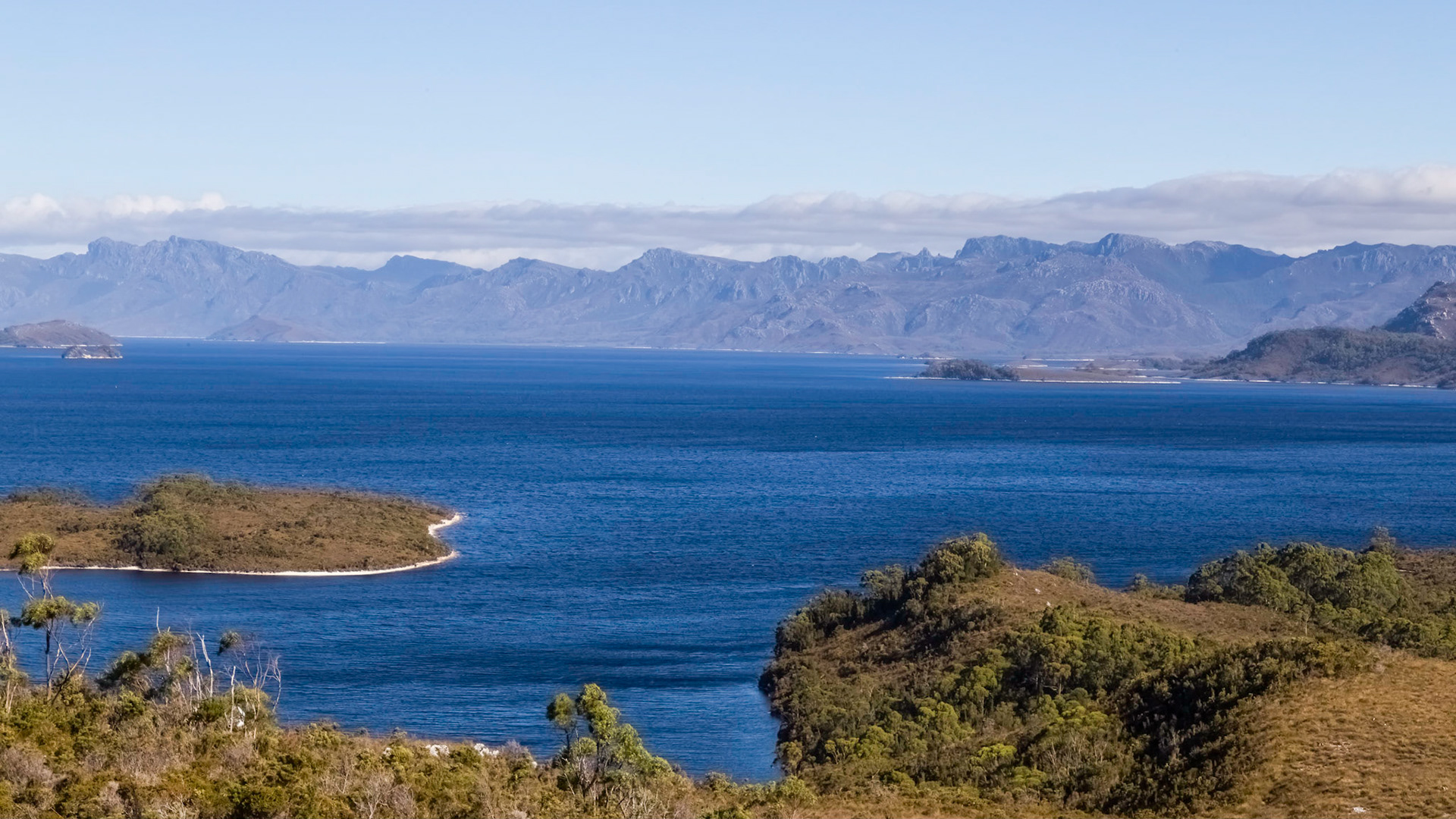 From Strathgordon, across Lake Peddar to the ranges in the Southwest National Park