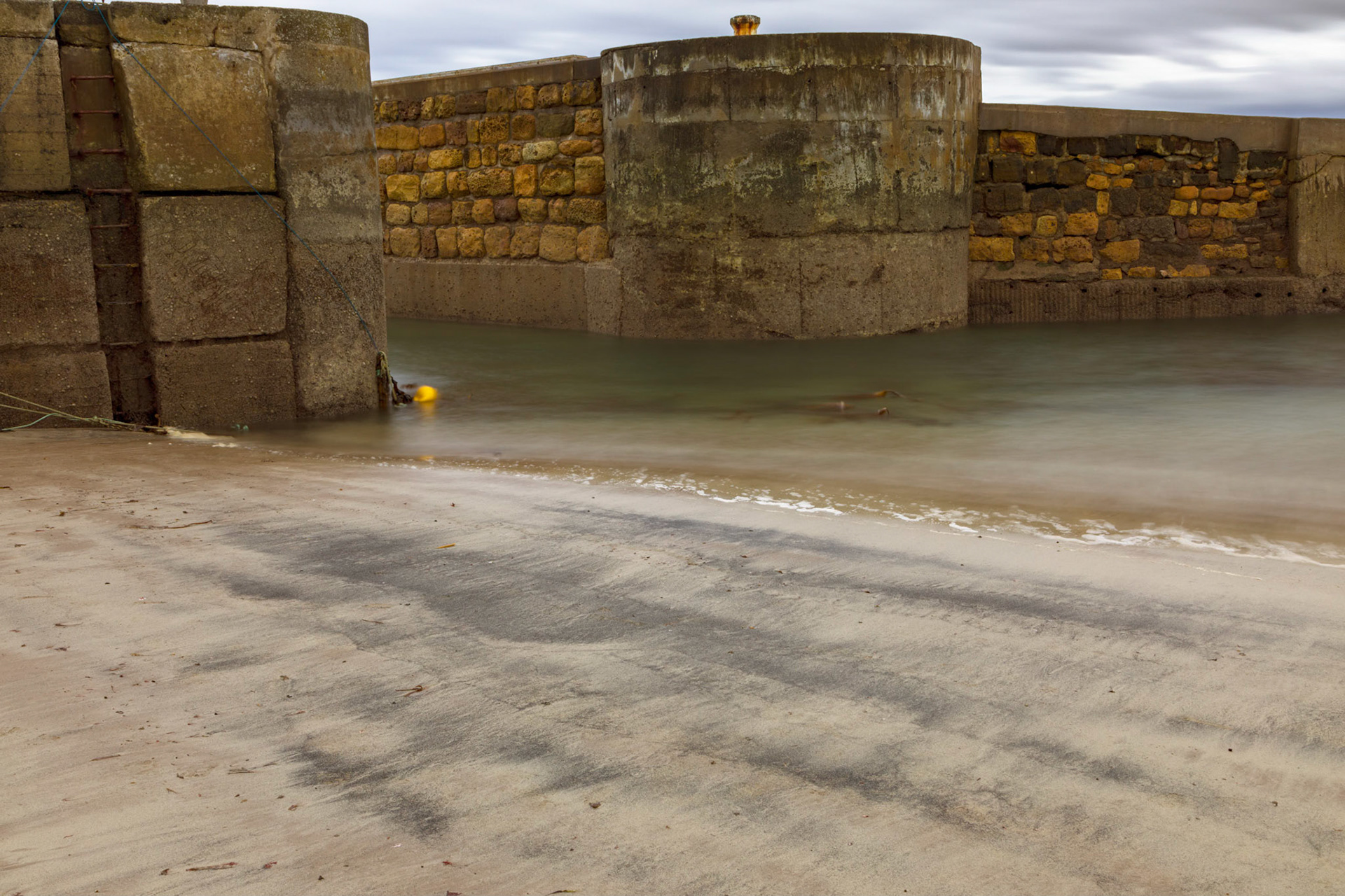 Beadnell Harbour entrance at low tide