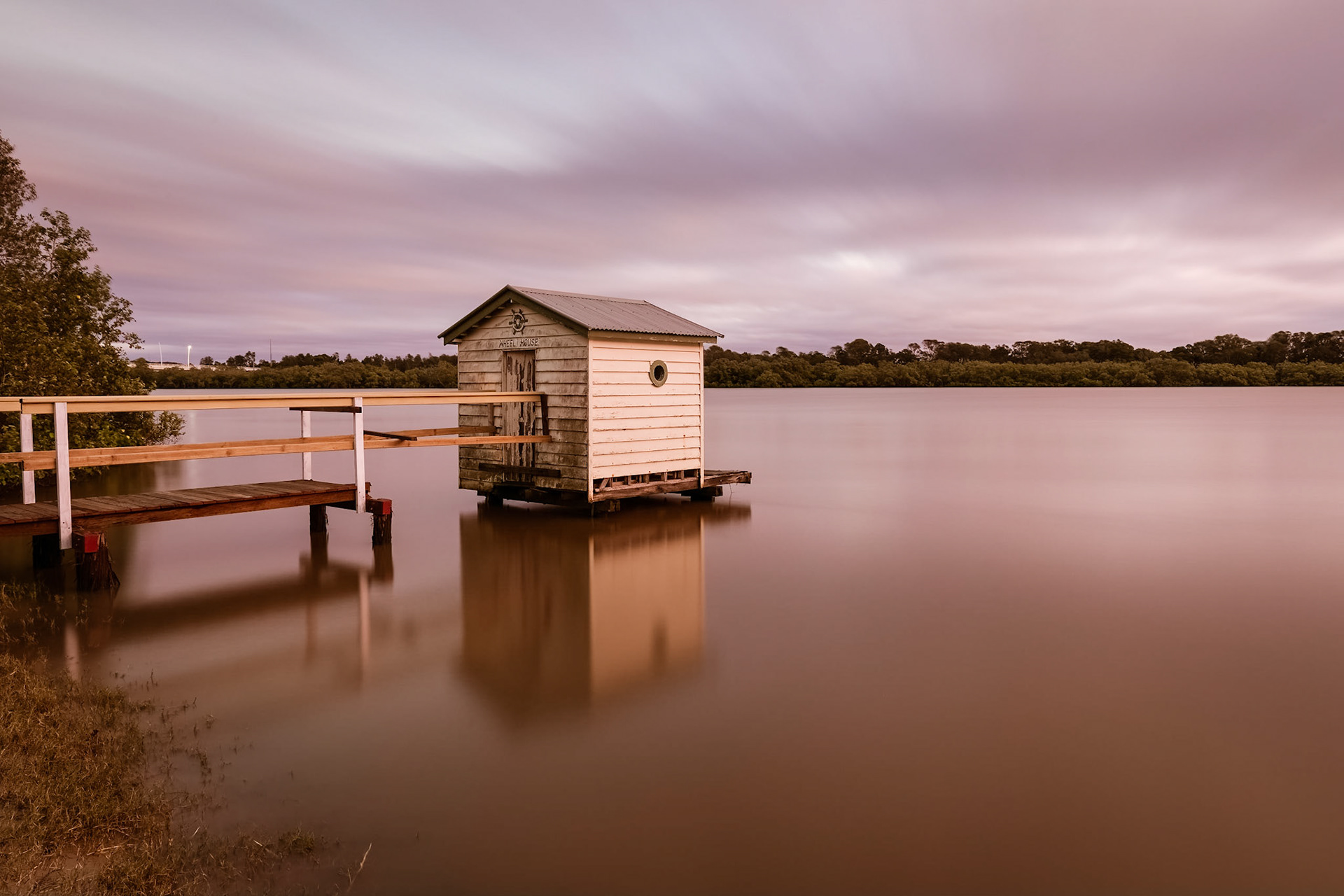 Dawn light on the Maroochy River at the boatsheds