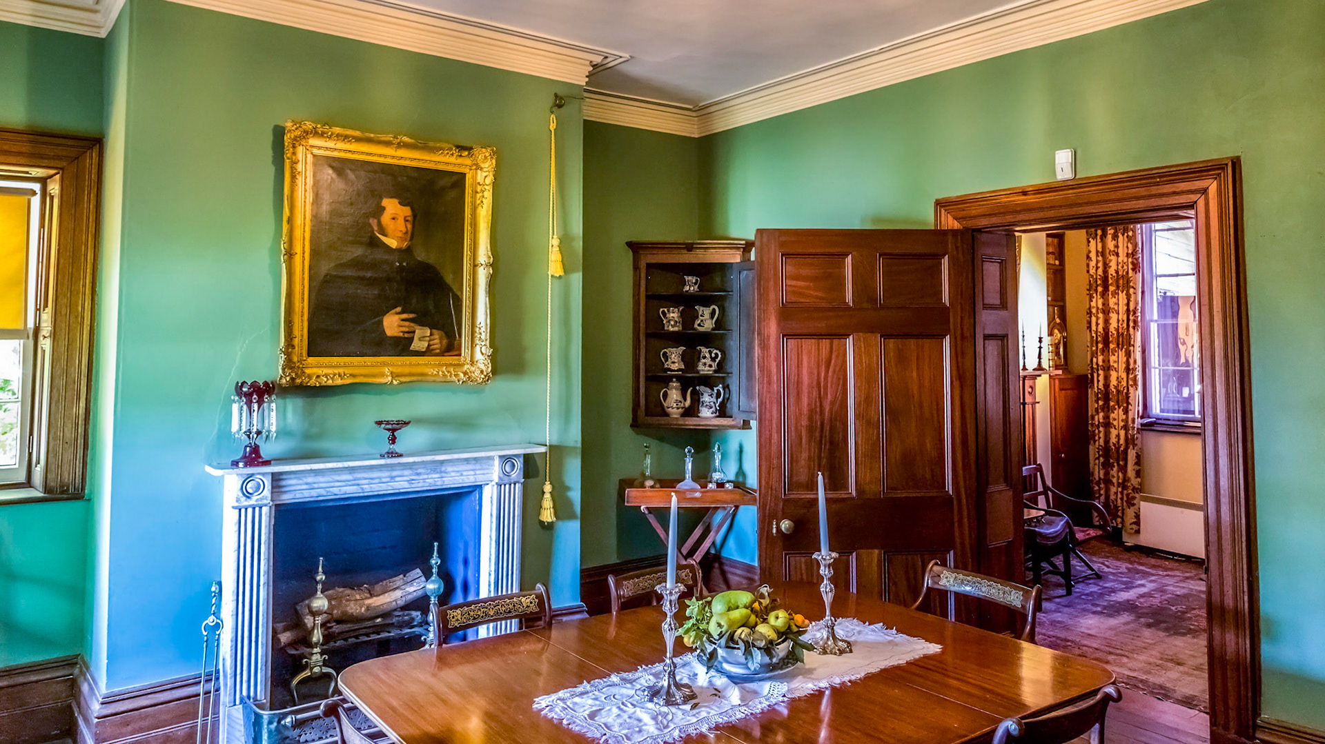 Rooms of Franklin House. Furnished by the National Trust with a collection of fine English period furniture and some colonial pieces, fine china and objets d'art. The National Trust of Tasmania was founded in 1960 for the specific purpose of saving this house from demolition, to purchase it and to undetake its restoration and furnishing. The house was built in 1838 by Mr Britton Jones, who arrived in Hobart Town in 1820 as a convict from England.