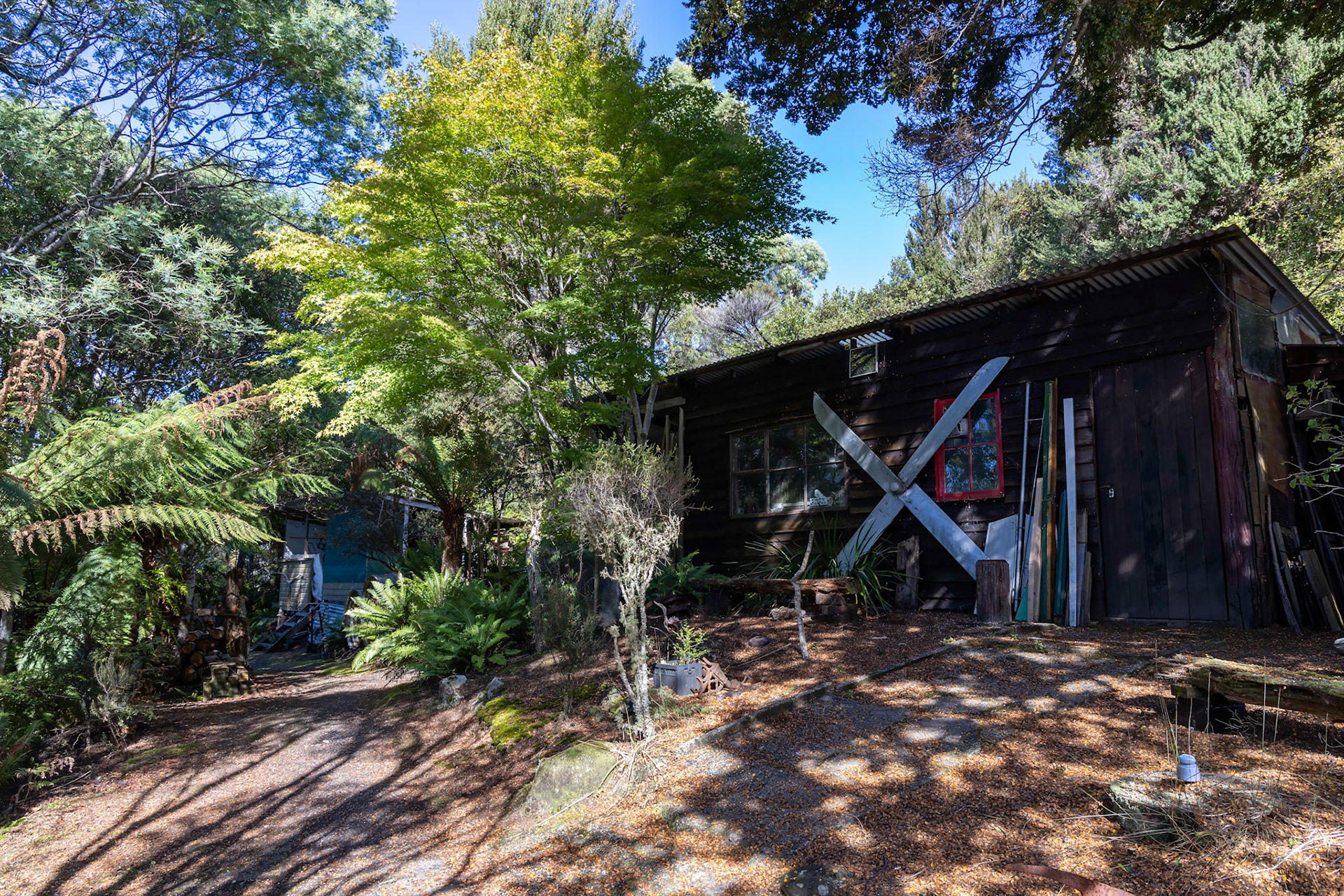 Port Davey pioneer Deny King. Some of his home buildings.