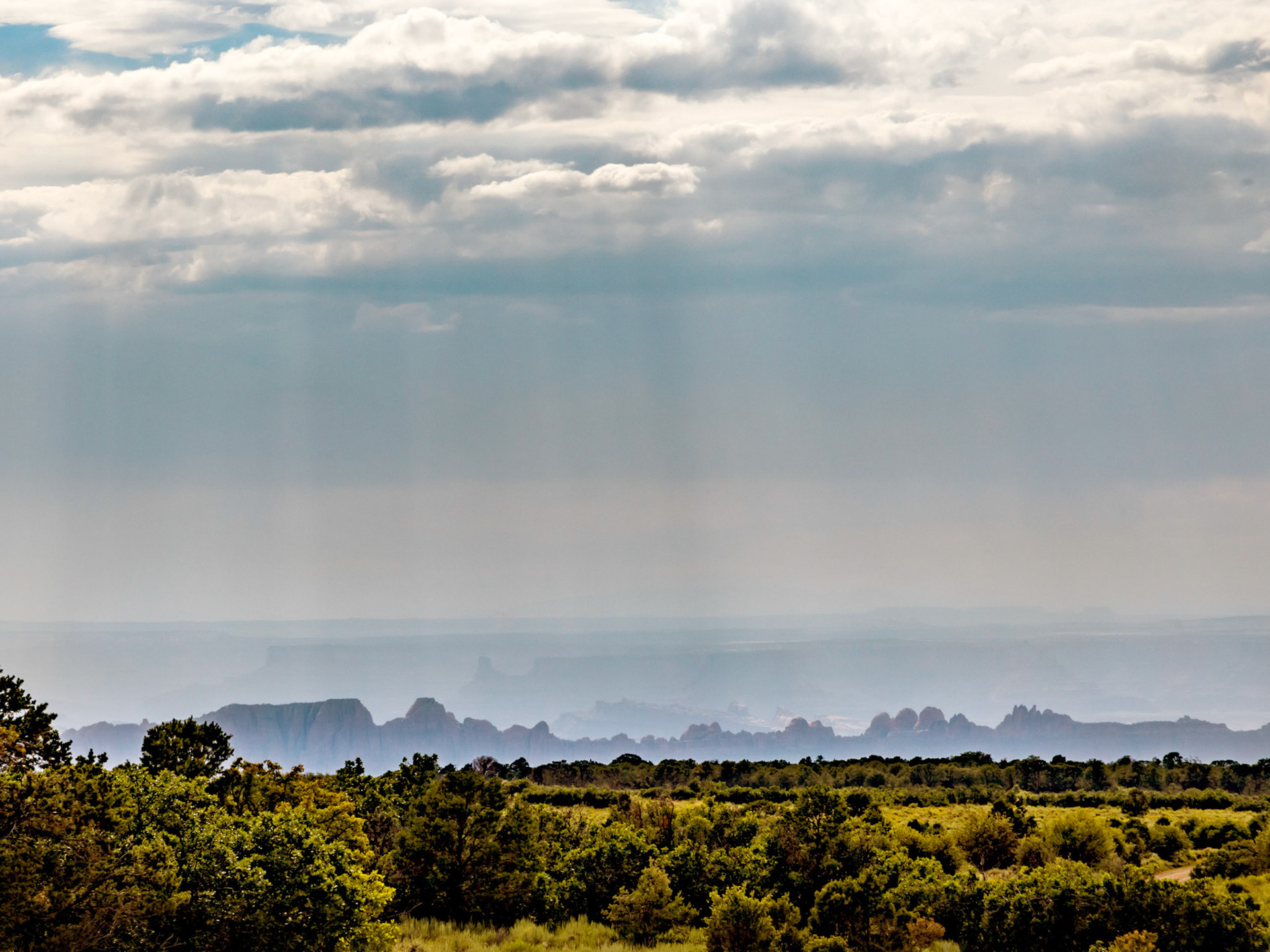A view from the mountain road down across to Canyonlands National Park.