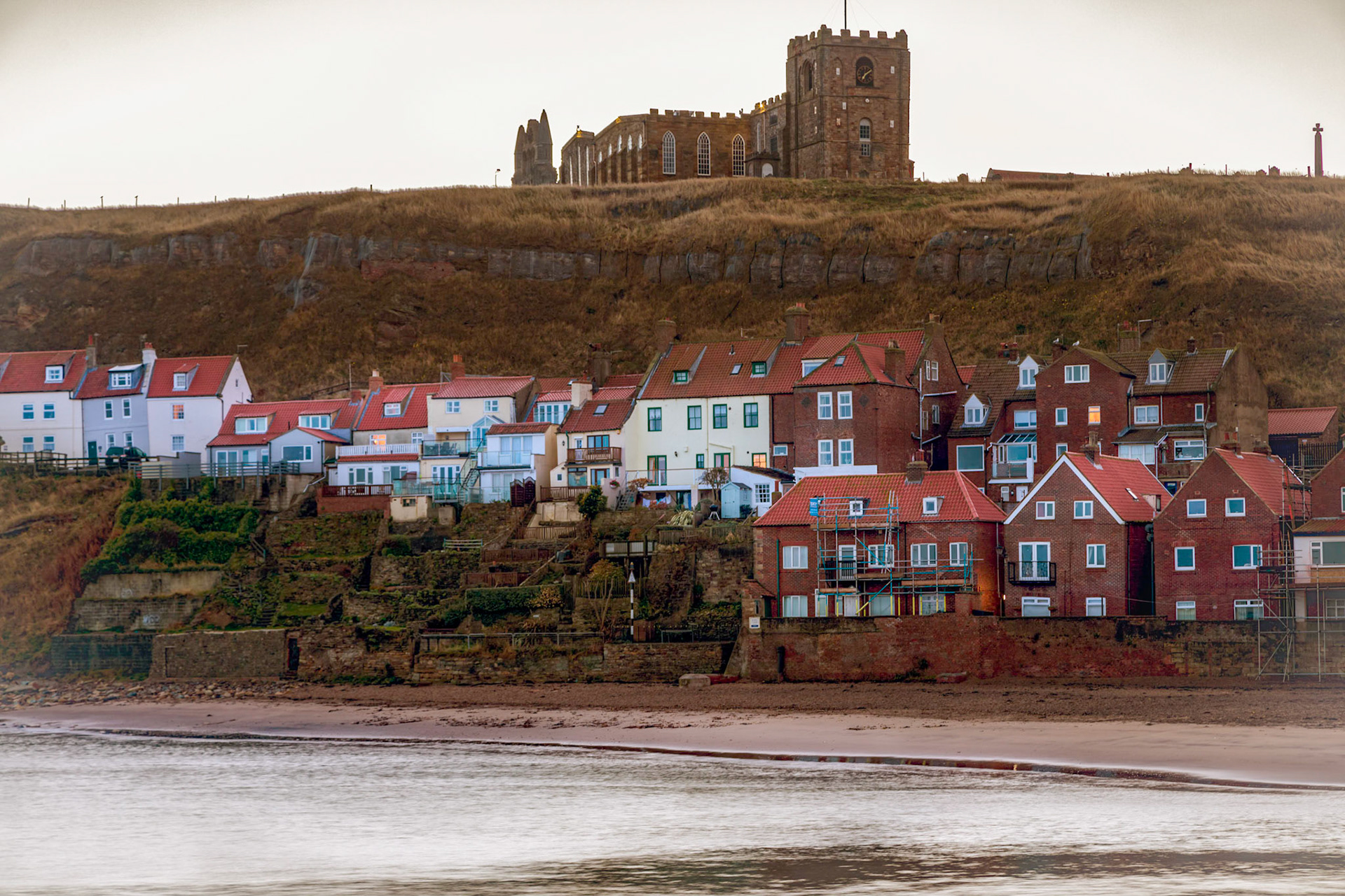 Dawn light behind the Abbey ruins on the East Cliff at Whitby
