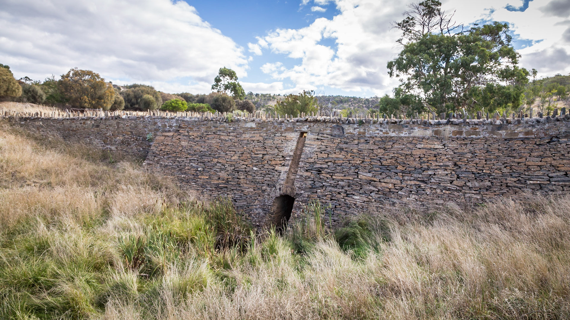 Road across Spiky Bridge (1840s) is part of the old convict-built coach road that connected Swansea with Little Swanport and the east coast road to Hobart