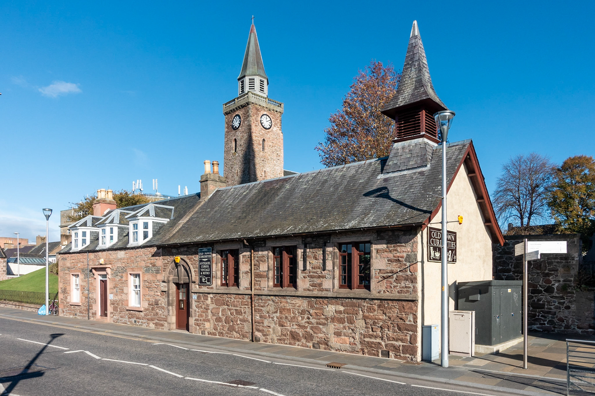 'Old Town Curiosities' shop in renovated Salvation Army mission hall, on bank of River Ness